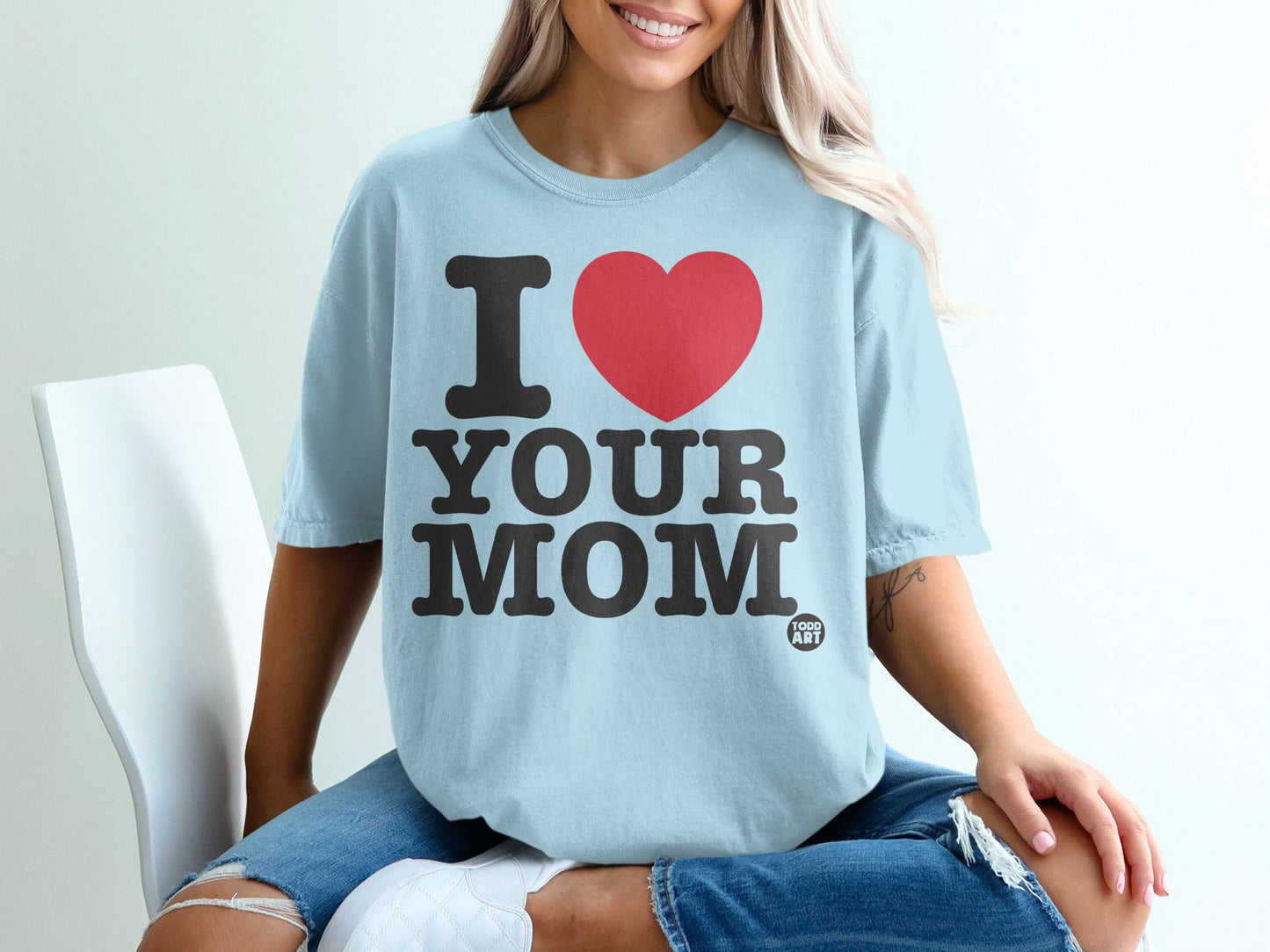 Light blue t-shirt with large red heart and "I YOUR MOM" text.
