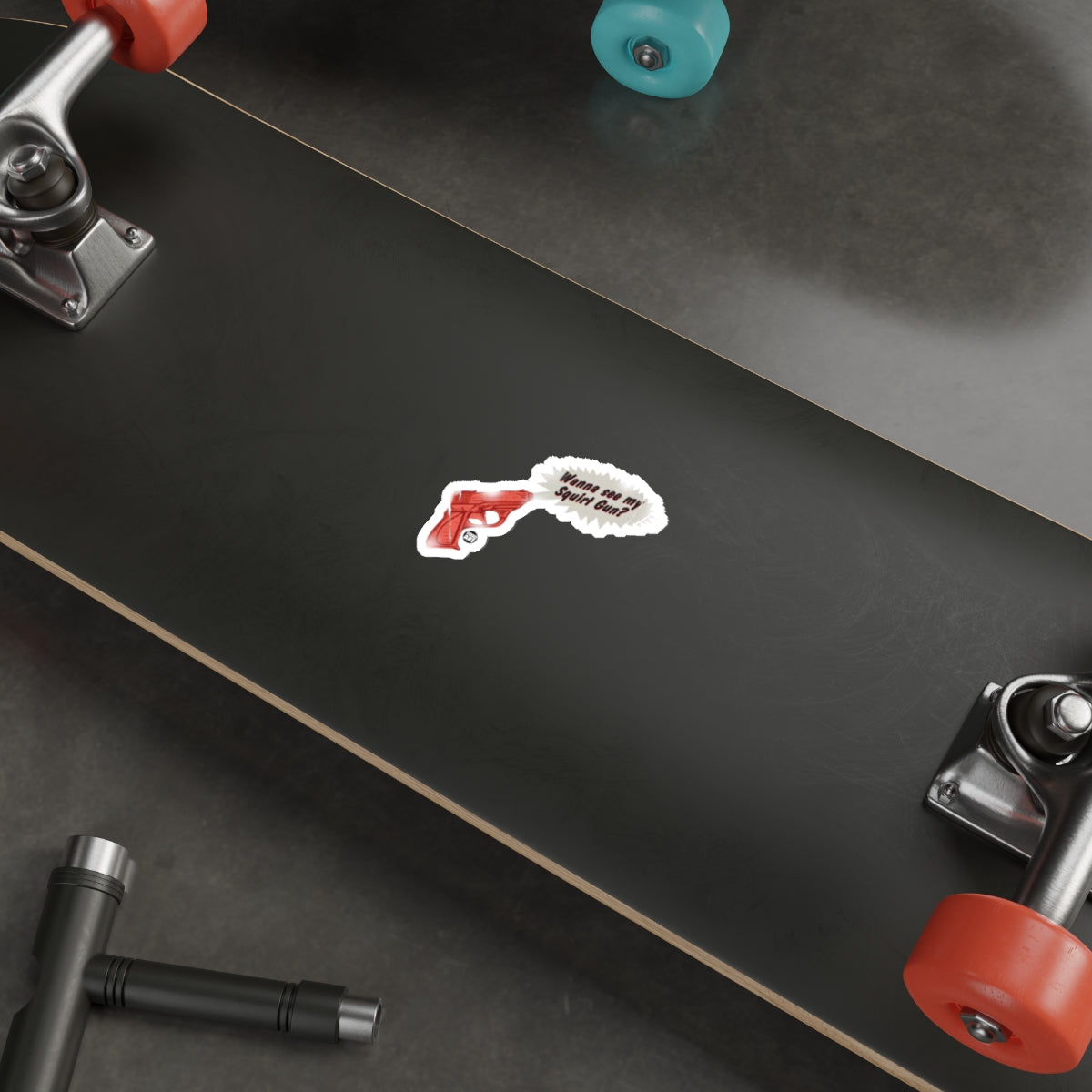 Black Skateboard with Red Gun Sticker Design