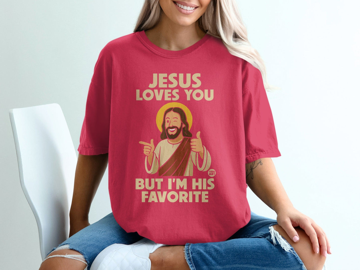 Red t-shirt with Jesus text "Jesus loves you but I'm his favorite."