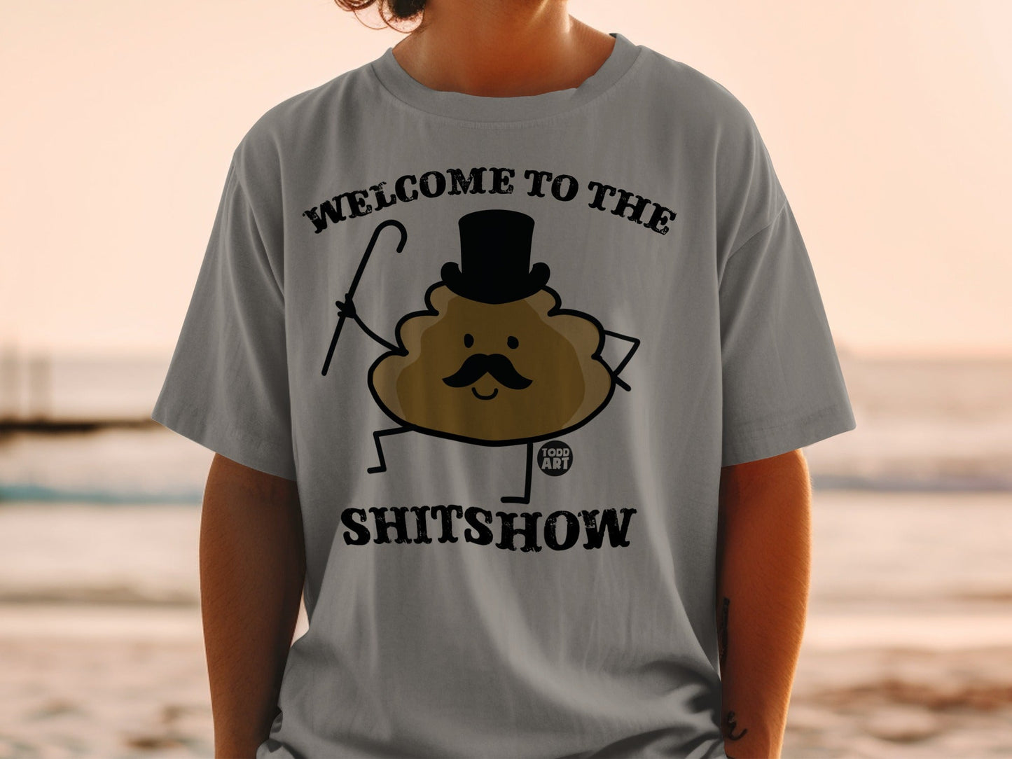 Brown cartoon poop character wearing top hat and holding cane, text WELCOME TO THE SHITSHOW.