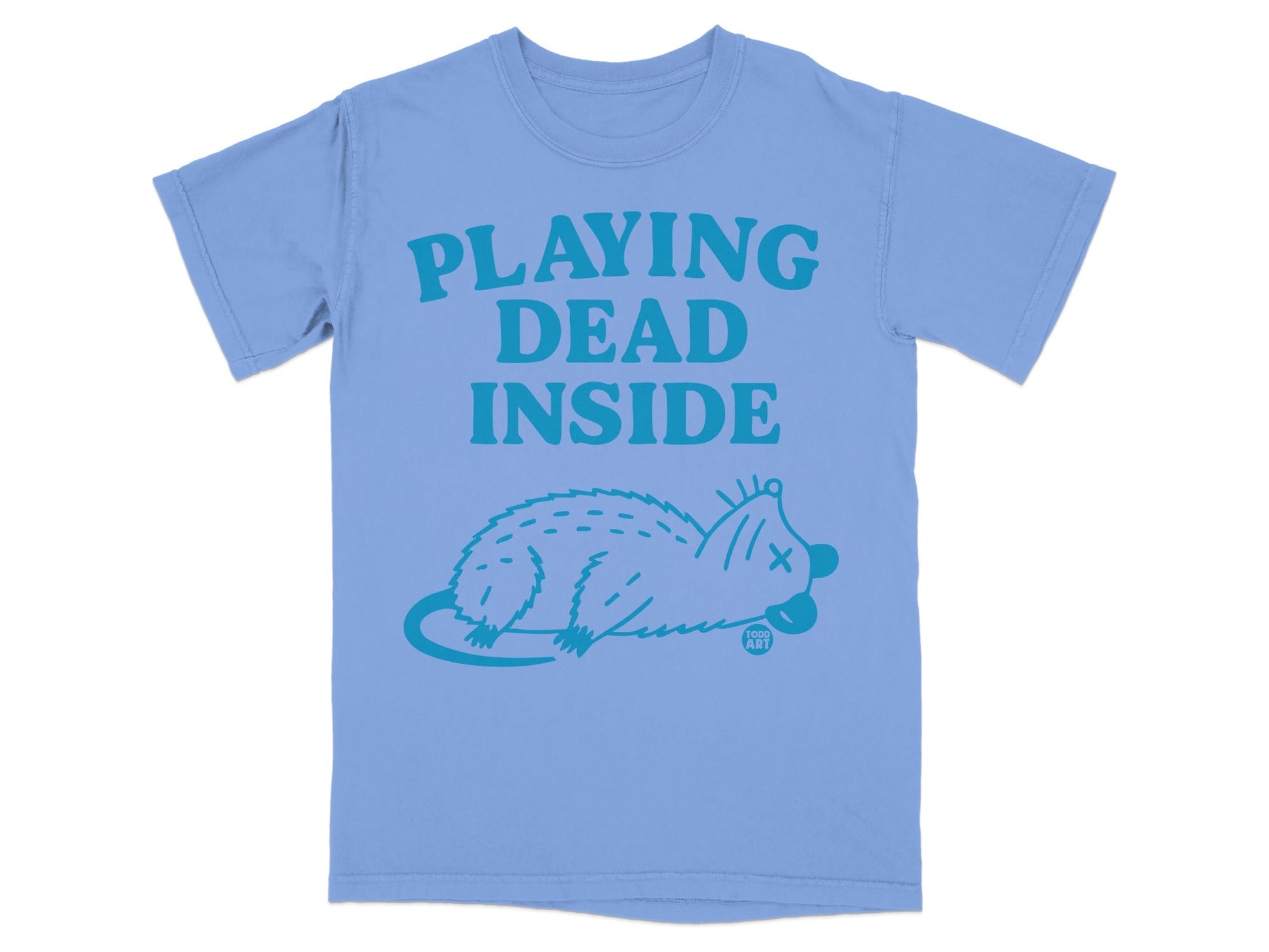 Light blue t-shirt with "PLAYING DEAD INSIDE" text and a cartoon opossum.