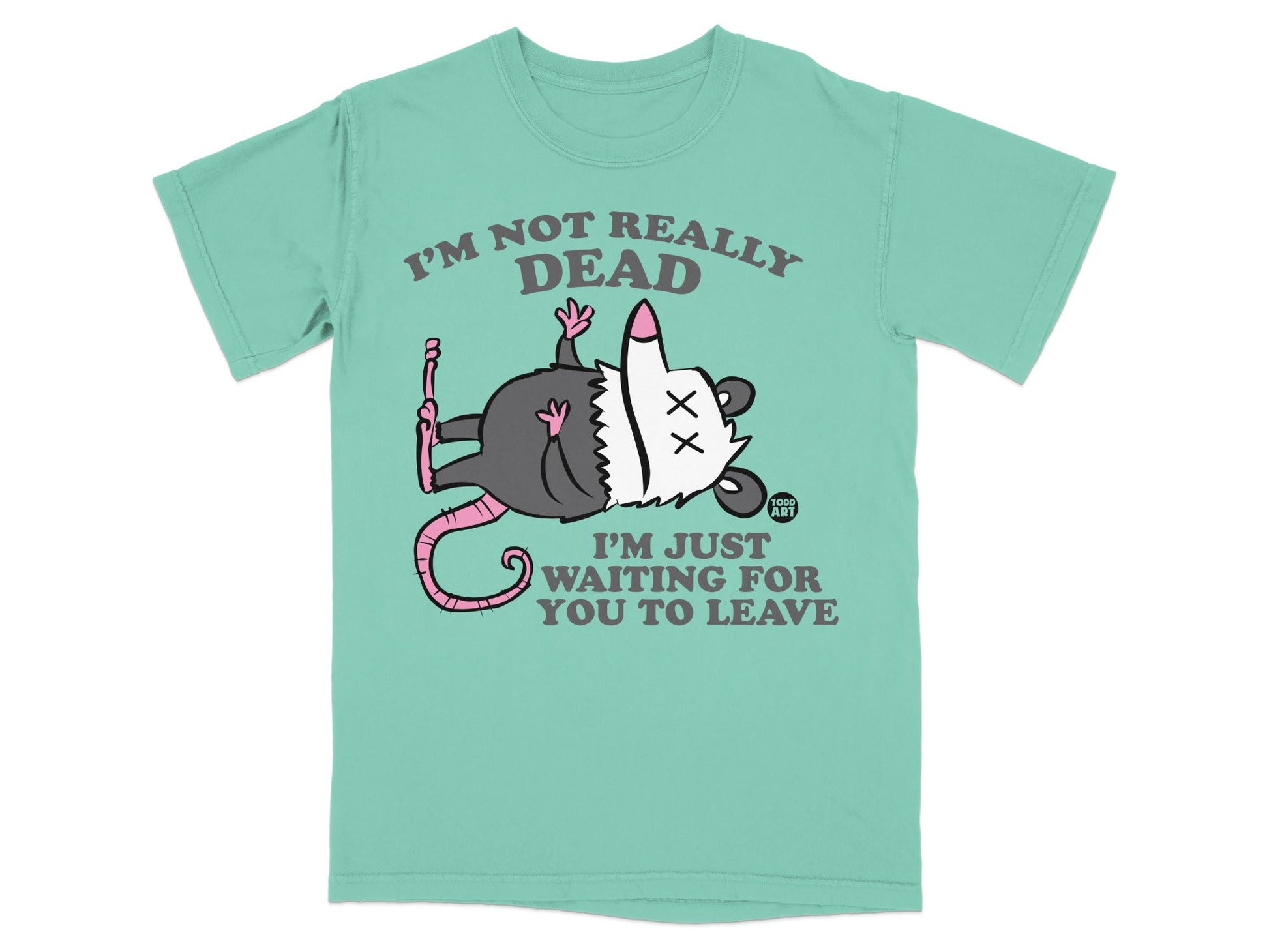 T-shirt with cartoon opossum playing dead, text "I'M NOT REALLY DEAD I'M JUST WAITING FOR YOU TO LEAVE".