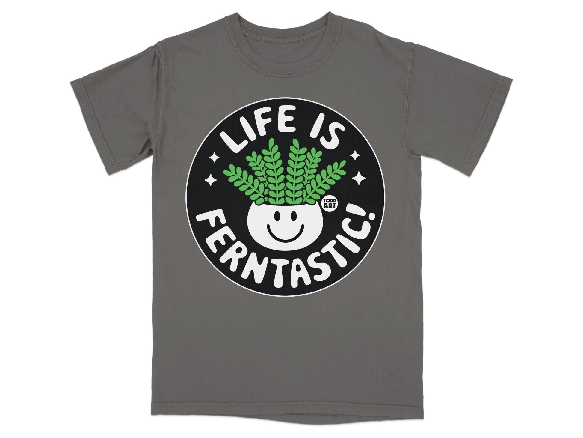 T-shirt with "Life is Ferntastic!" text and cartoon plant in pot.