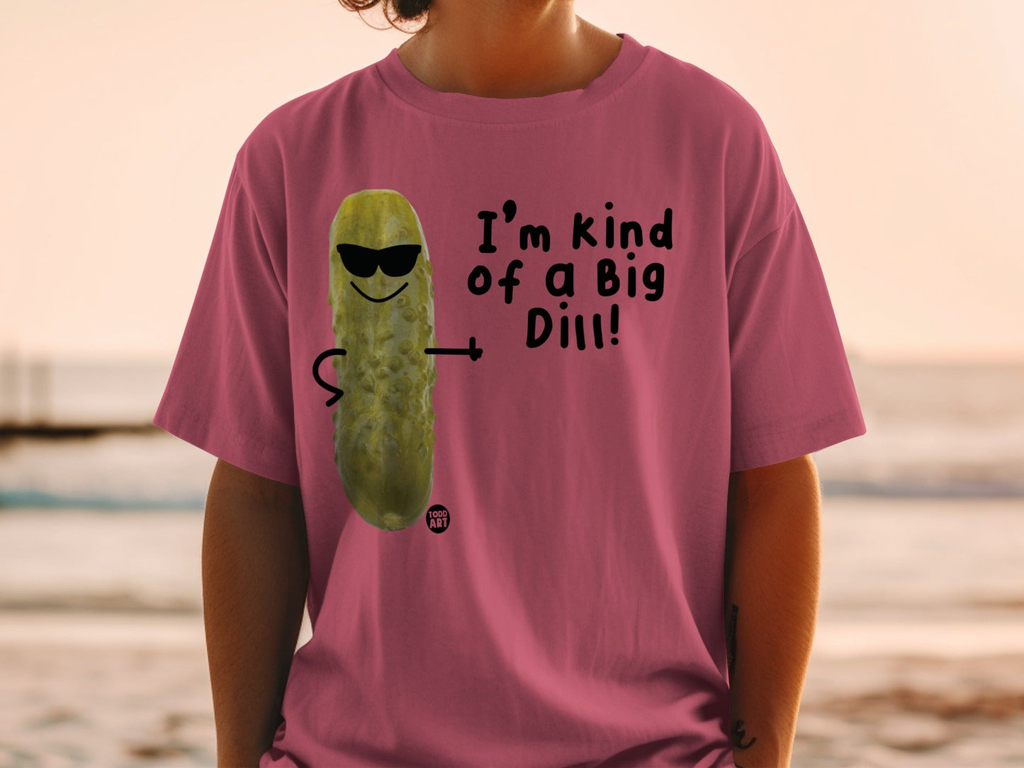 T-shirt with cartoon pickle wearing sunglasses and text "I'm kind of a Big Dill!".