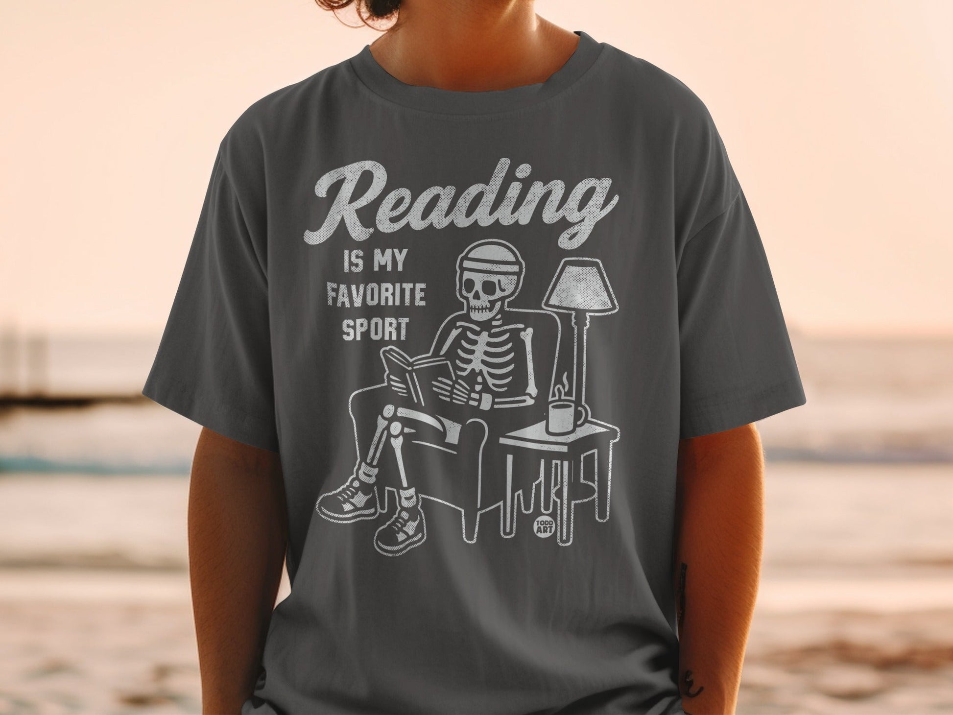 Reading Is My Favorite Sport Skeleton Graphic Tee