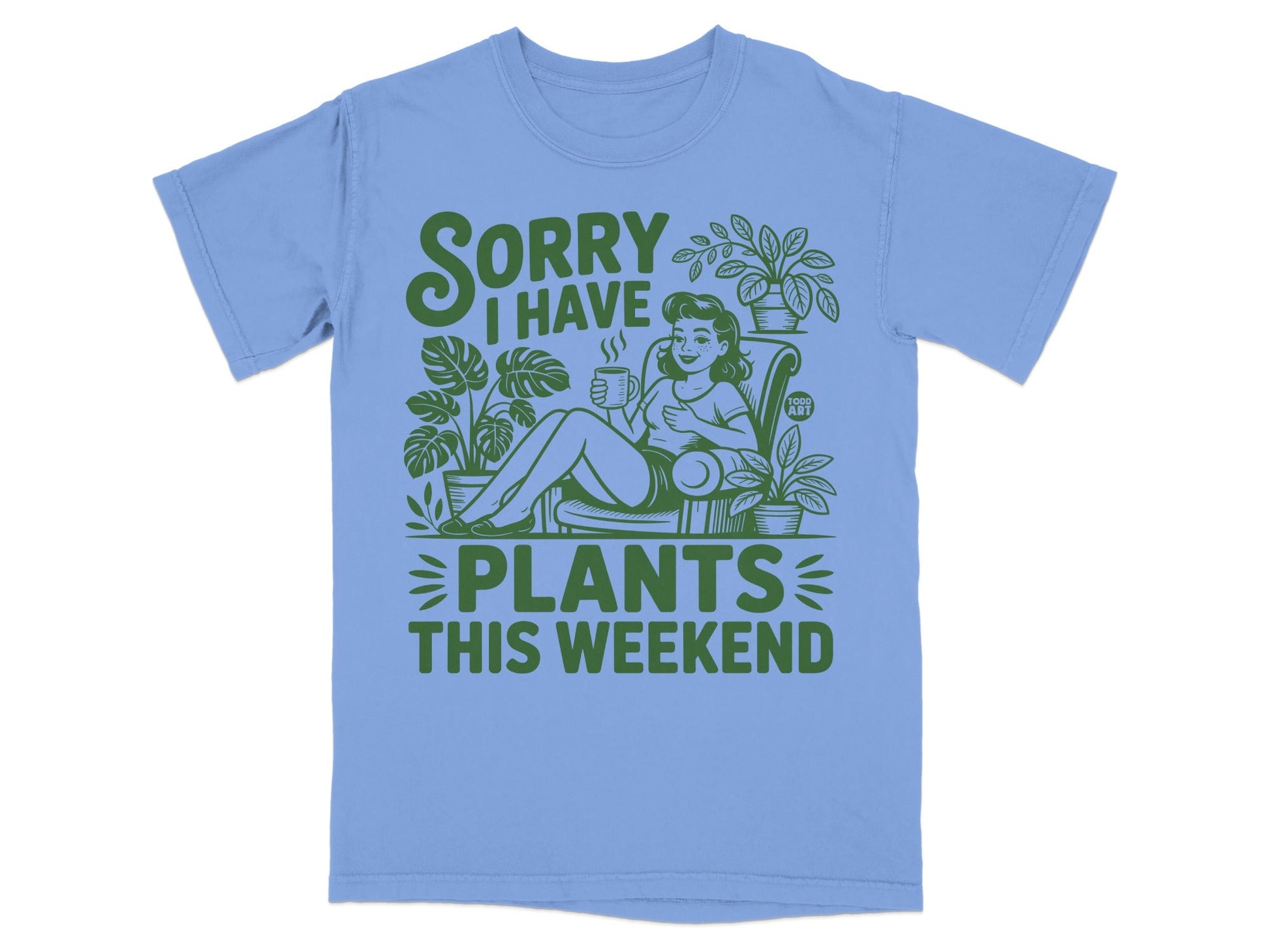 T-shirt with green text "Sorry I have plants this weekend" and illustrated woman.