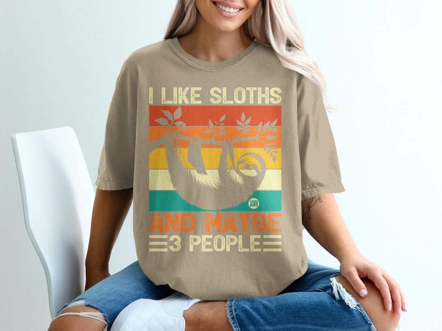 I like sloths and maybe three people t-shirt with retro stripe background.