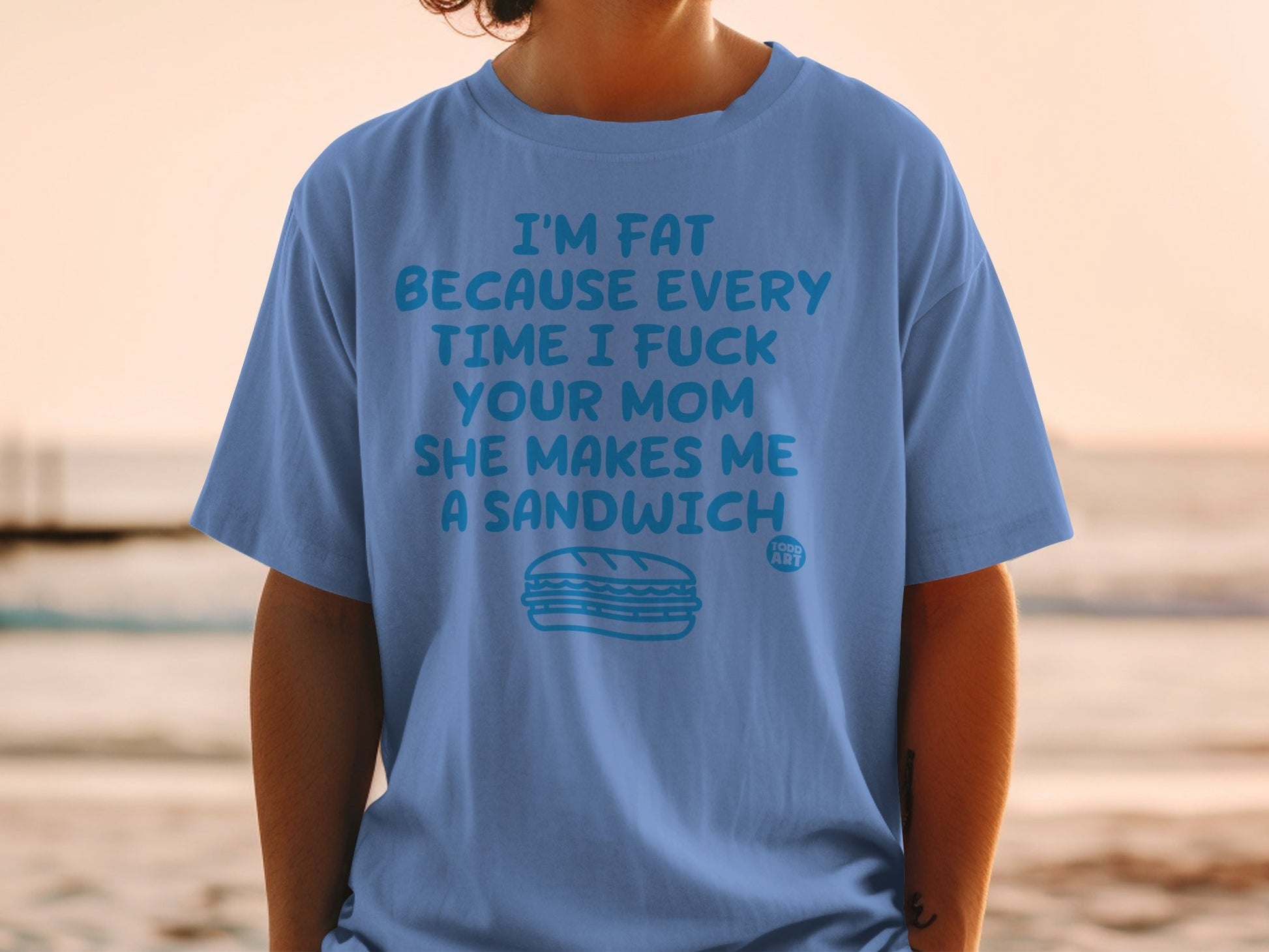 Blue t-shirt with text about sandwiches and a sandwich illustration.