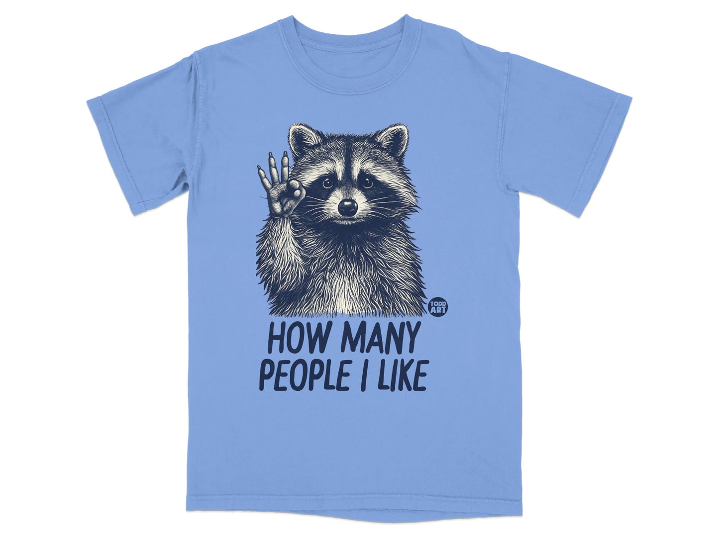 T-shirt with raccoon raising paw and text "How Many People I Like".