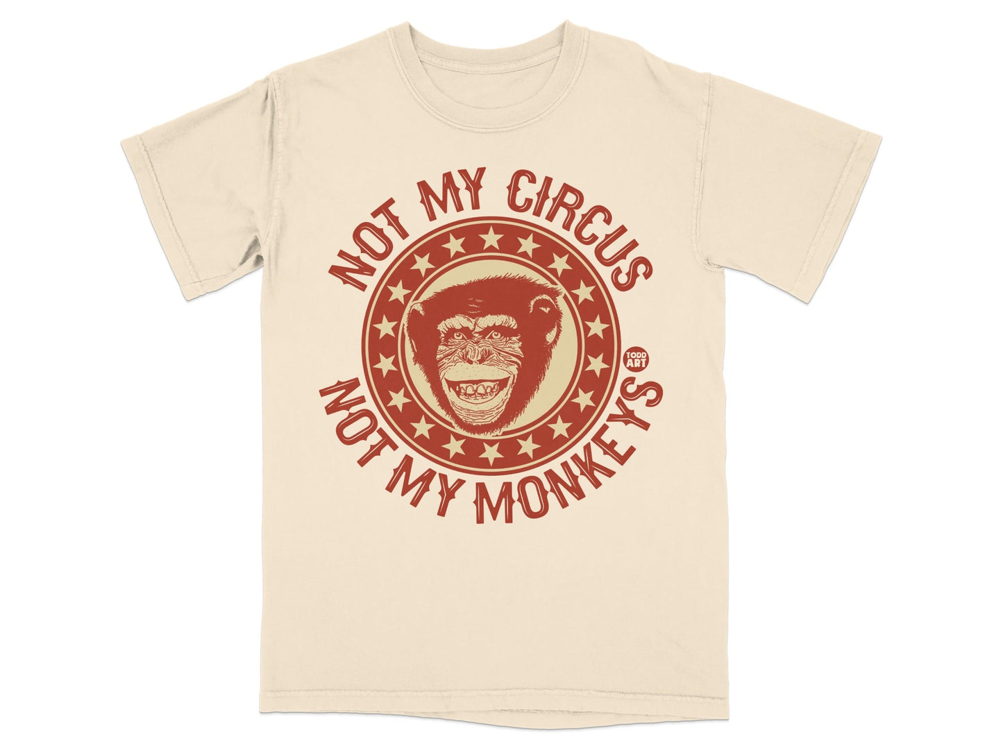 Cream t-shirt with "Not My Circus, Not My Monkeys" text and monkey illustration.