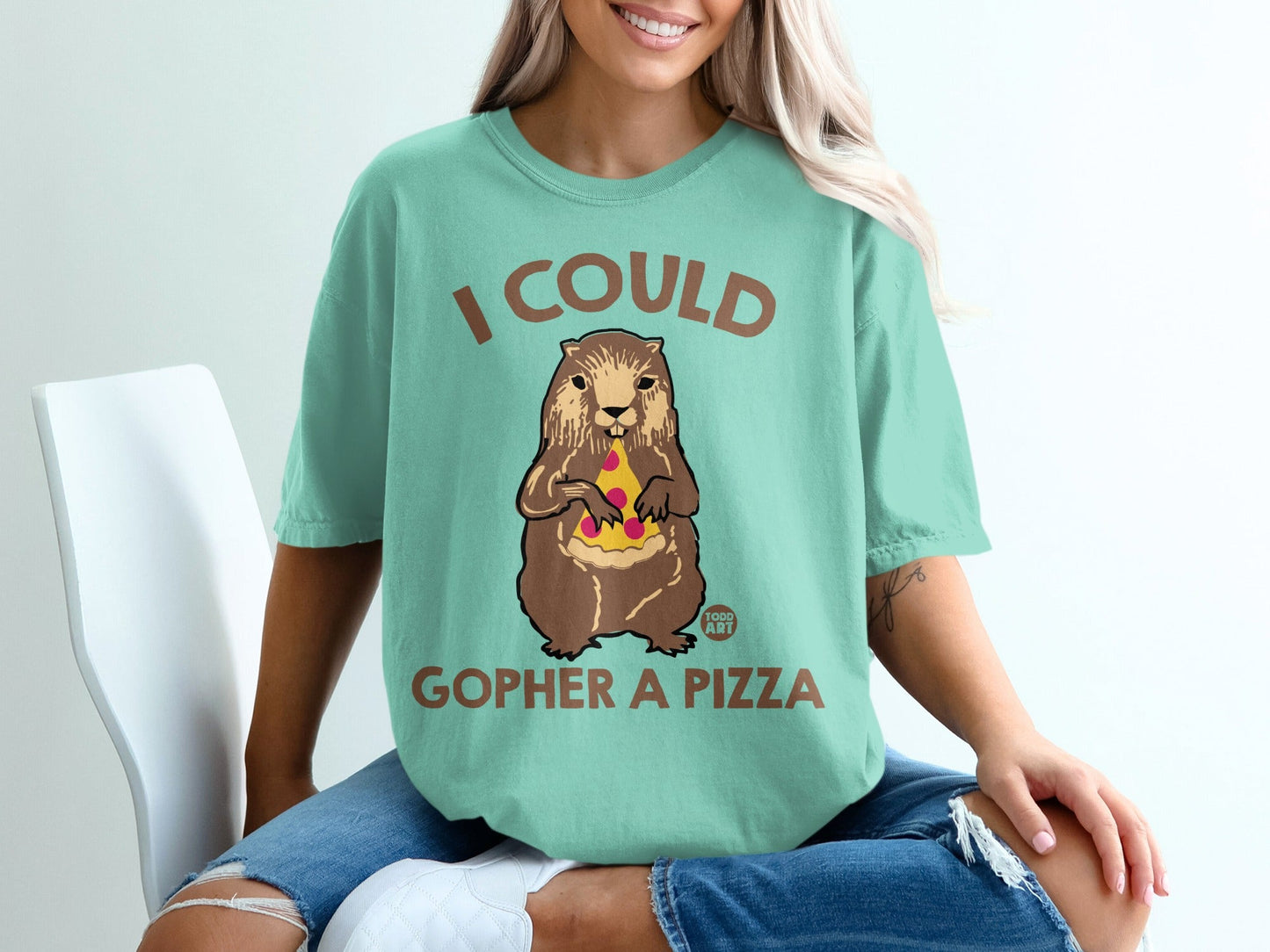 Gopher holding pizza slice with text "I could gopher a pizza".