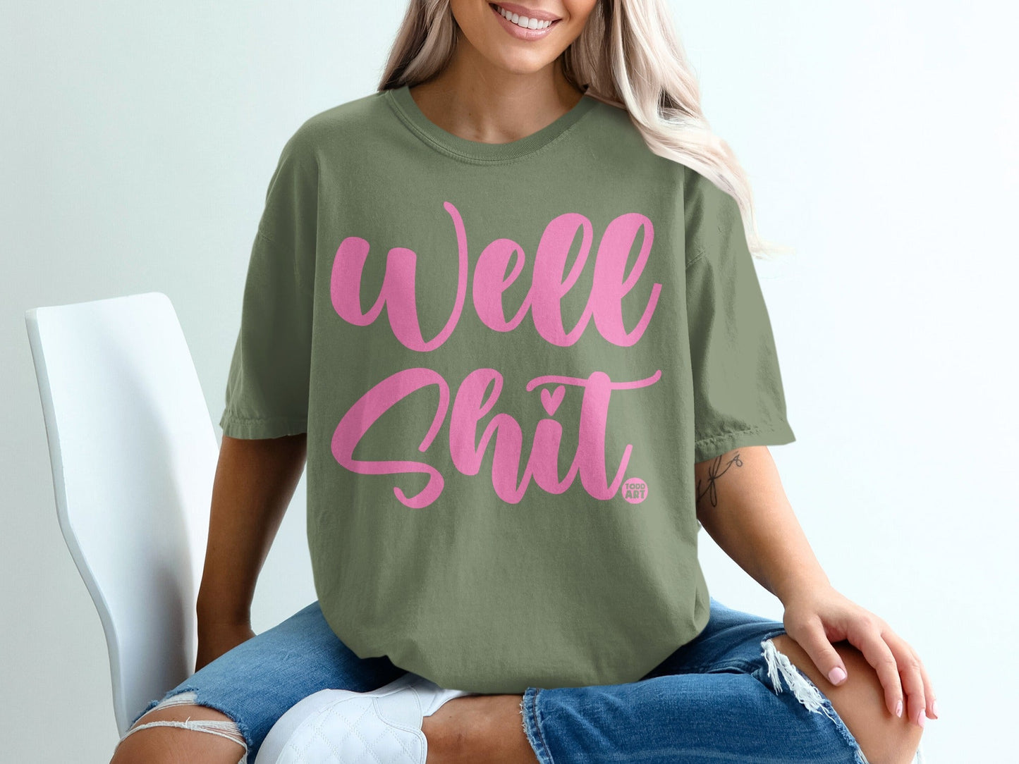 Well Shit Pink Text Over Green Background T-shirt