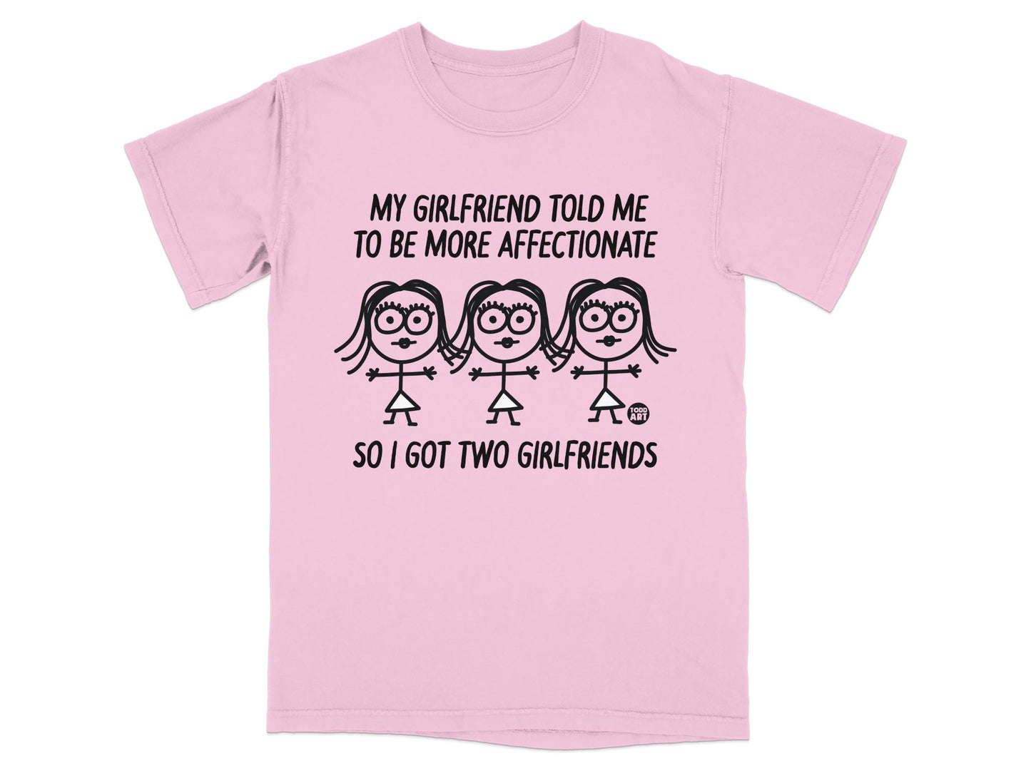 Pink t-shirt with stick figures and text "My girlfriend told me to be more affectionate. So I got two girlfriends."