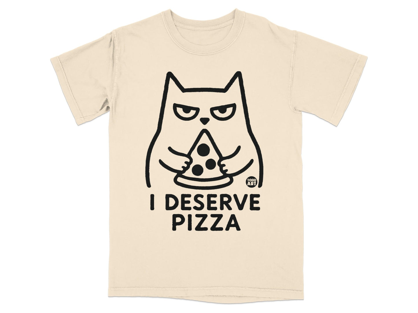 Cream t-shirt with a cartoon cat holding a pizza slice and text "I DESERVE PIZZA".