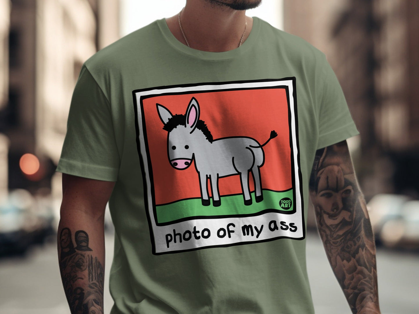 Green t-shirt with cartoon donkey and text "photo of my ass".