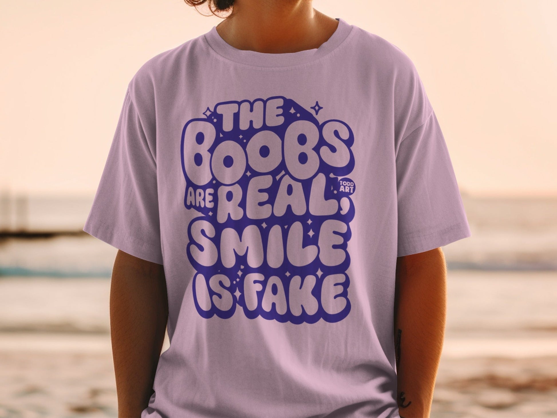 The Boobs Are Real Smile Is Fake Graphic Tee