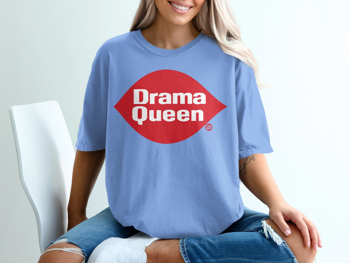 Blue t-shirt with red Drama Queen logo.