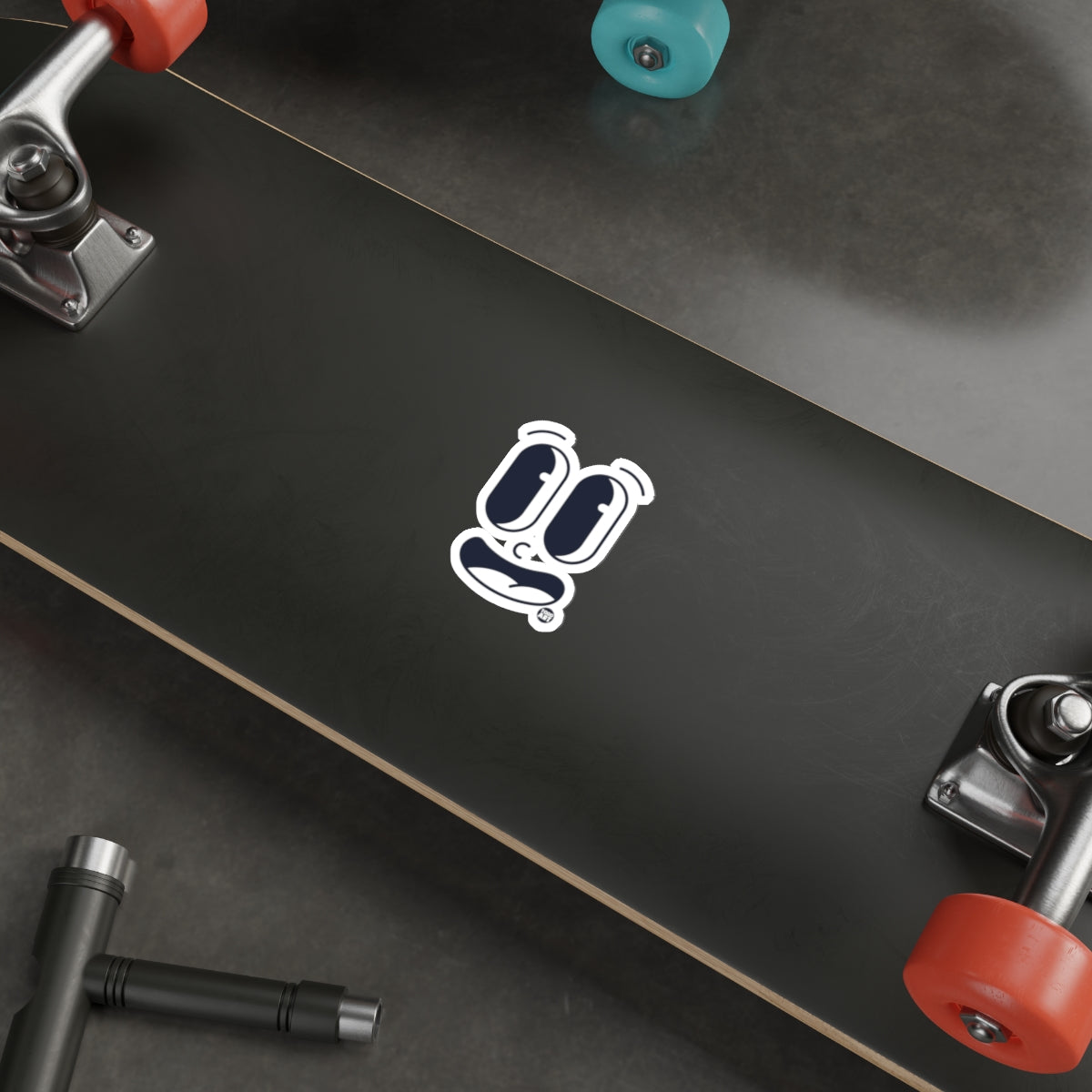 Fun Character Design on Black Skateboard Deck