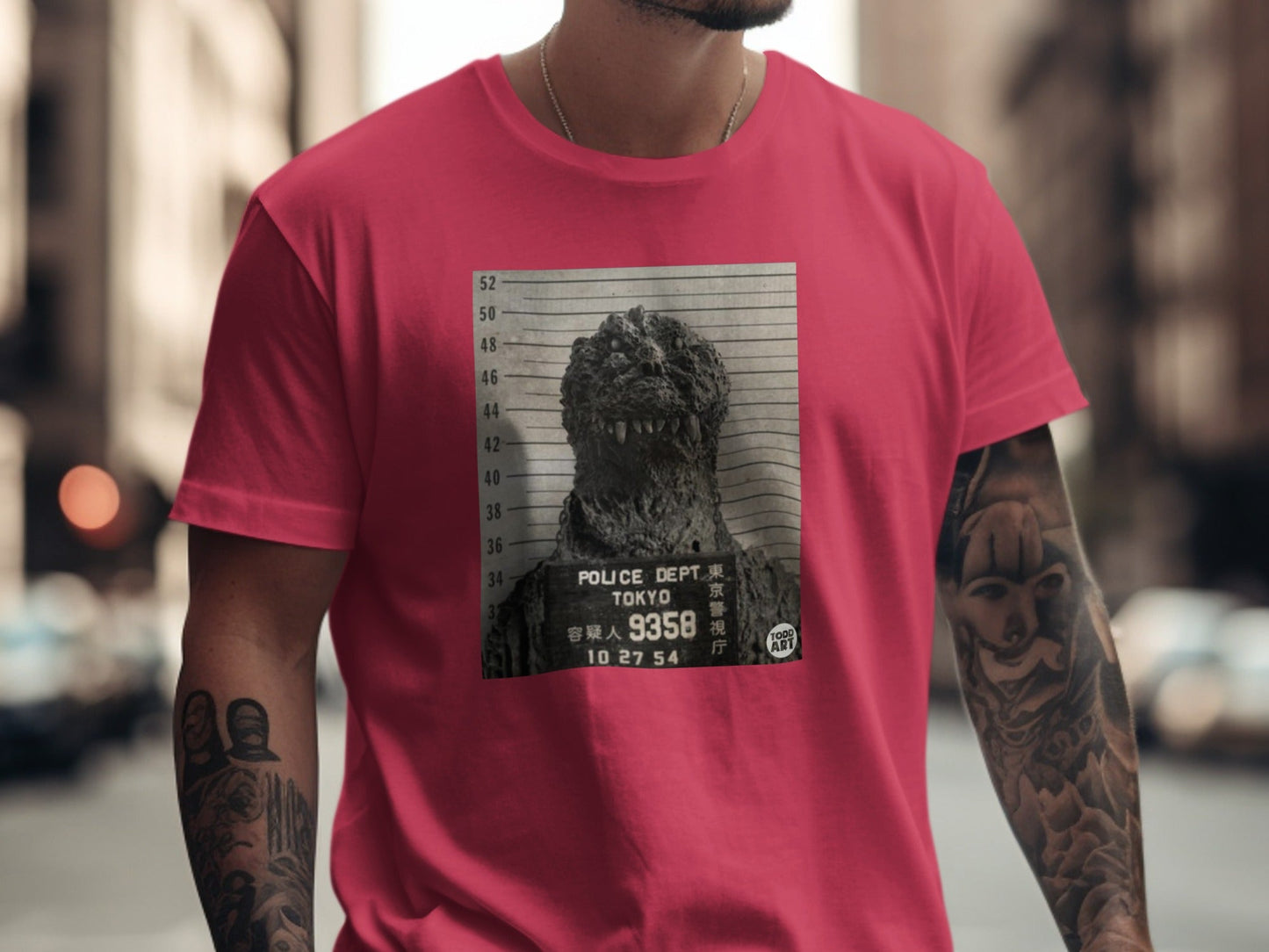 Crimson t-shirt with Godzilla mugshot: Tokyo Police Dept, suspect 9358, 10 27 54.
