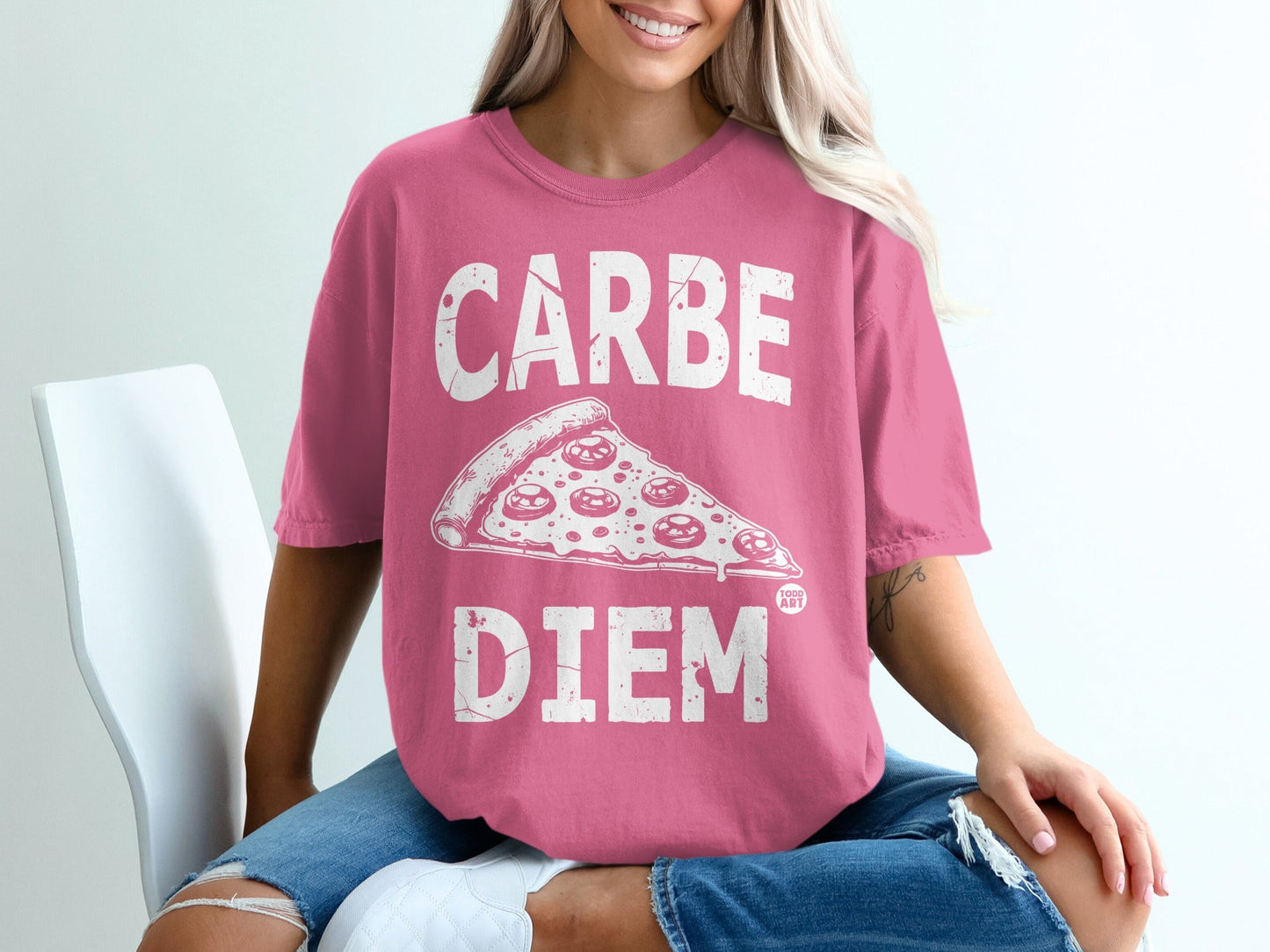 Pink t-shirt with "CARPE DIEM" and pizza slice graphic.