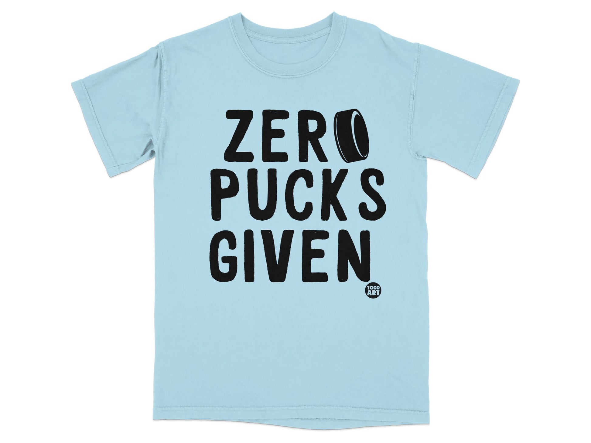 Light blue t-shirt with bold black text "ZERO PUCKS GIVEN" and a small logo.