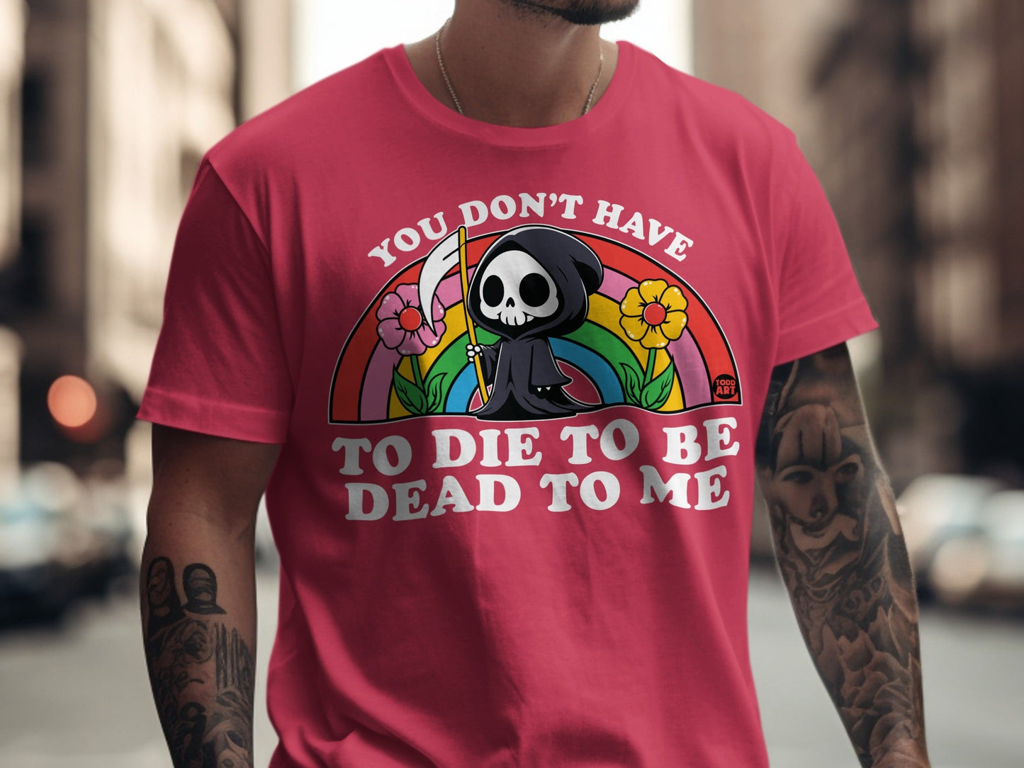 Grim reaper character with flowers and rainbow, "You don't have to die to be dead to me" text.