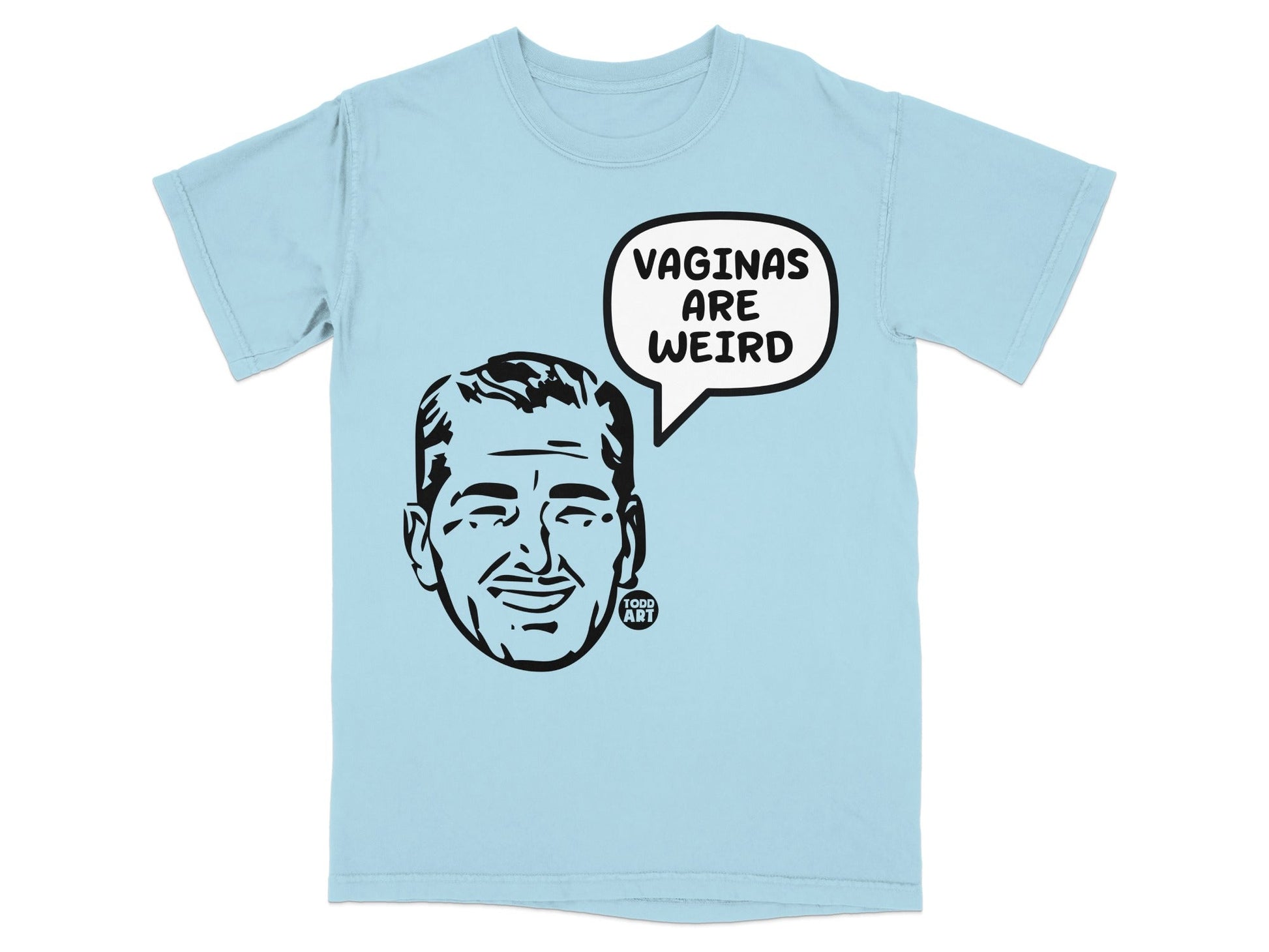 Light blue t-shirt with a black and white graphic of a man's face in a speech bubble that says "VAGINAS ARE WEIRD".