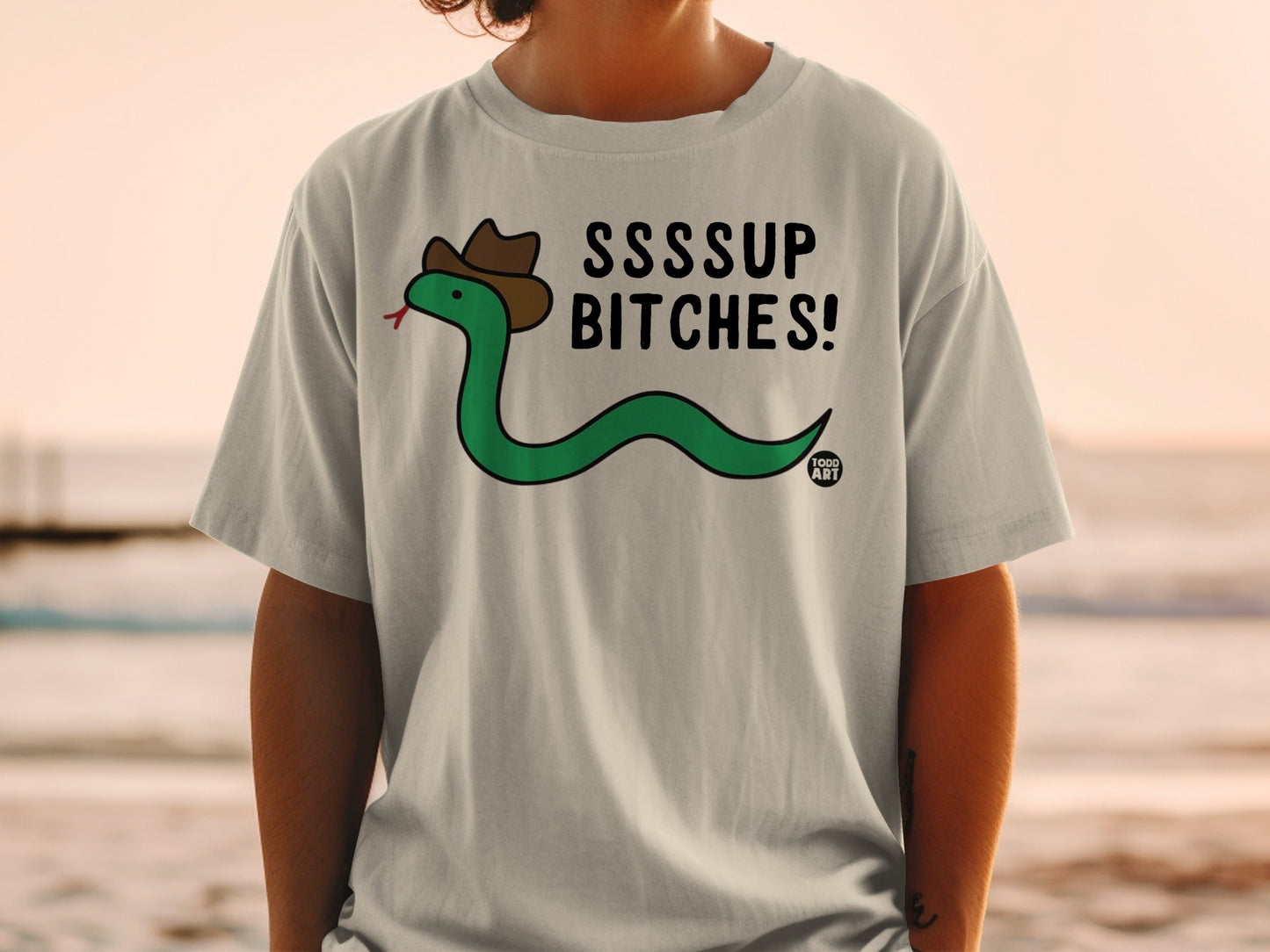 Green snake wearing a cowboy hat and "SSSSUP BITCHES!" text.