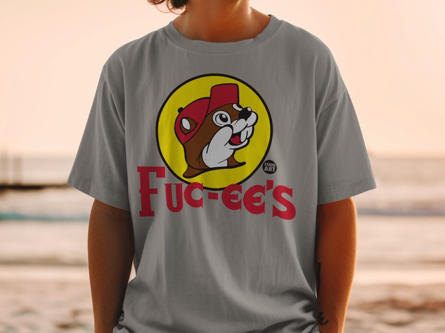 Bucees t-shirt with beaver mascot and red hat.