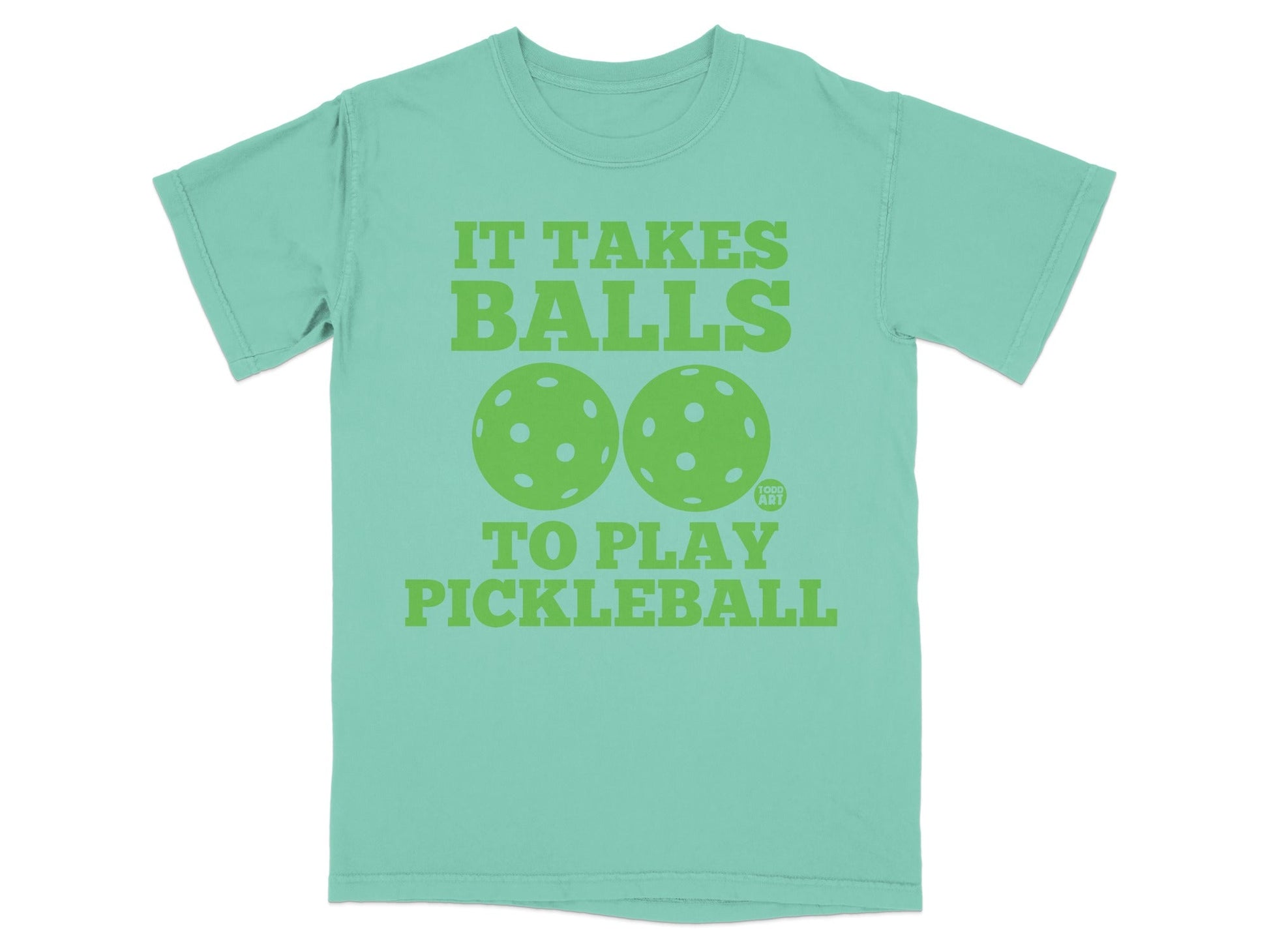 Mint green t-shirt with "IT TAKES BALLS TO PLAY PICKLEBALL" and pickleball graphics.