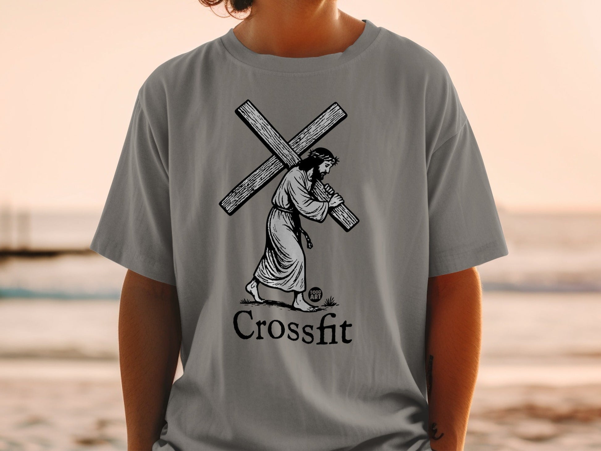 Jesus carrying the cross with "Crossfit" text below.