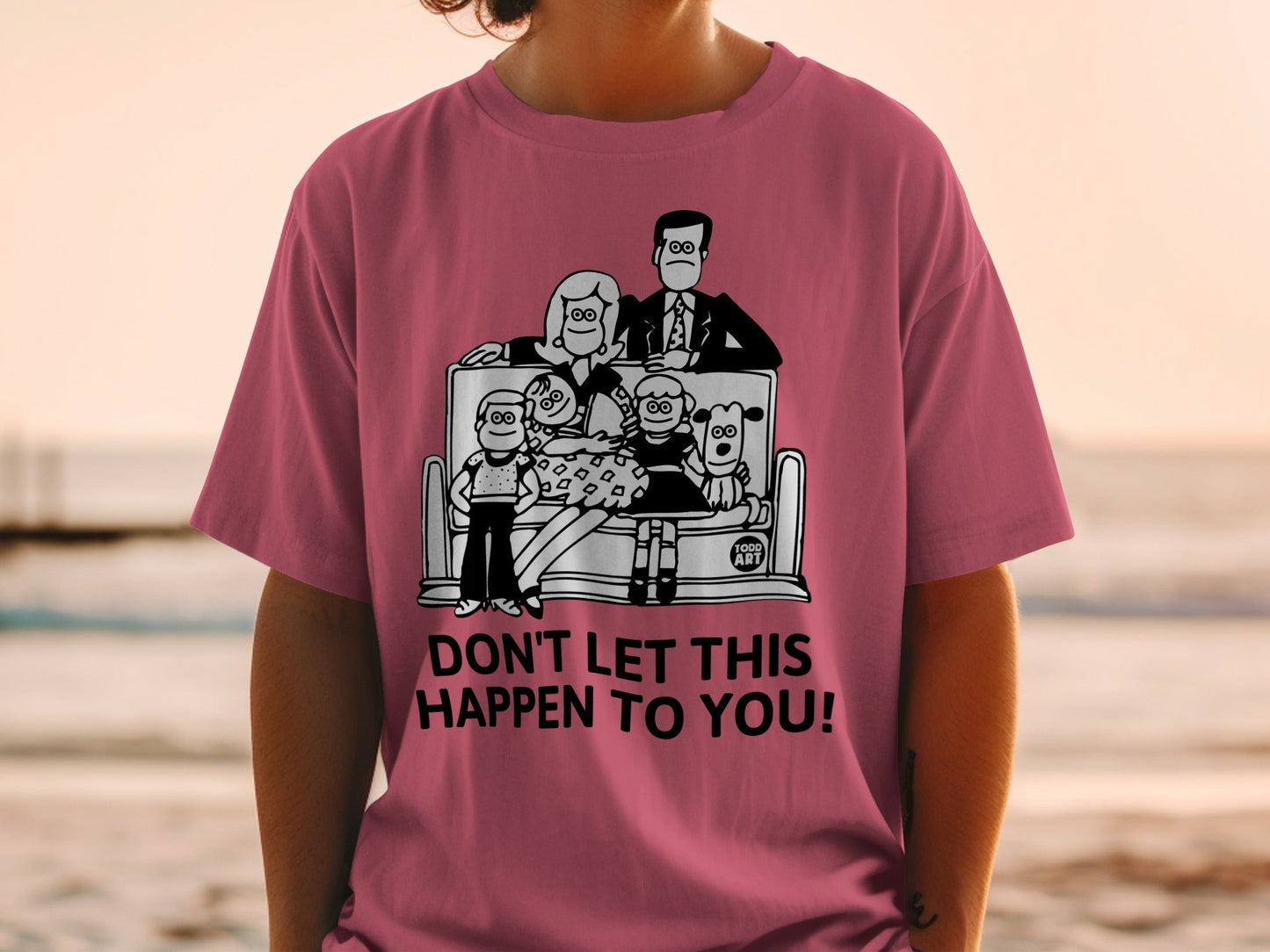 T-shirt with cartoon family on a bench and "DON'T LET THIS HAPPEN TO YOU!"