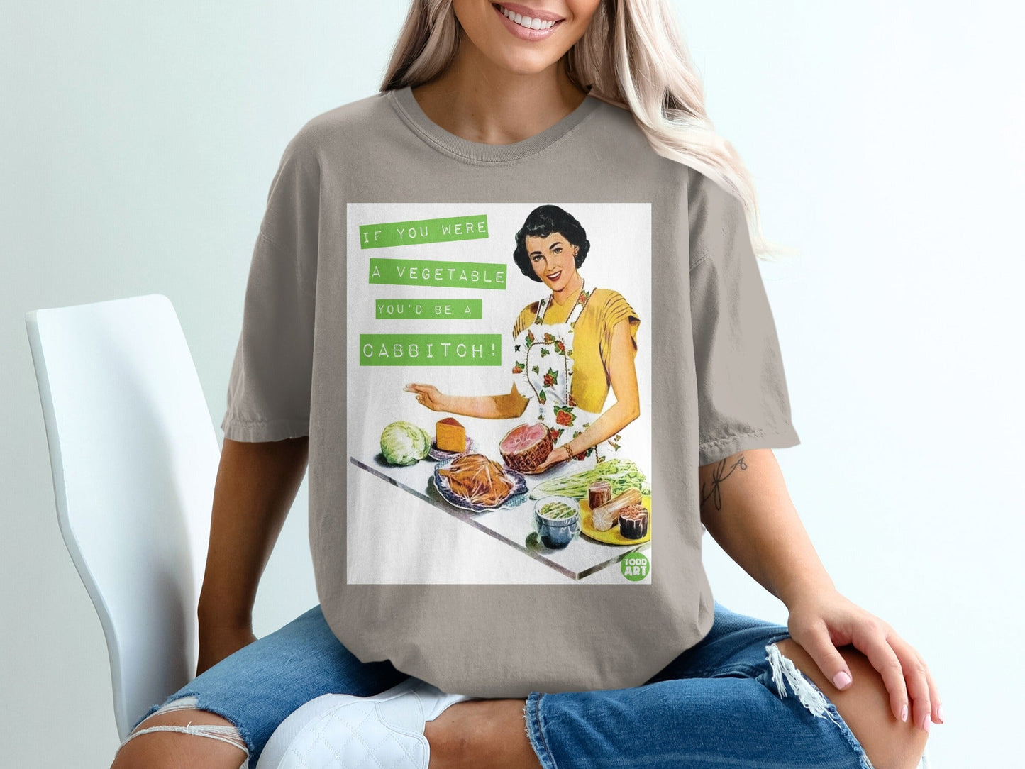 Woman in vintage style wearing a t-shirt with a retro illustration of food.