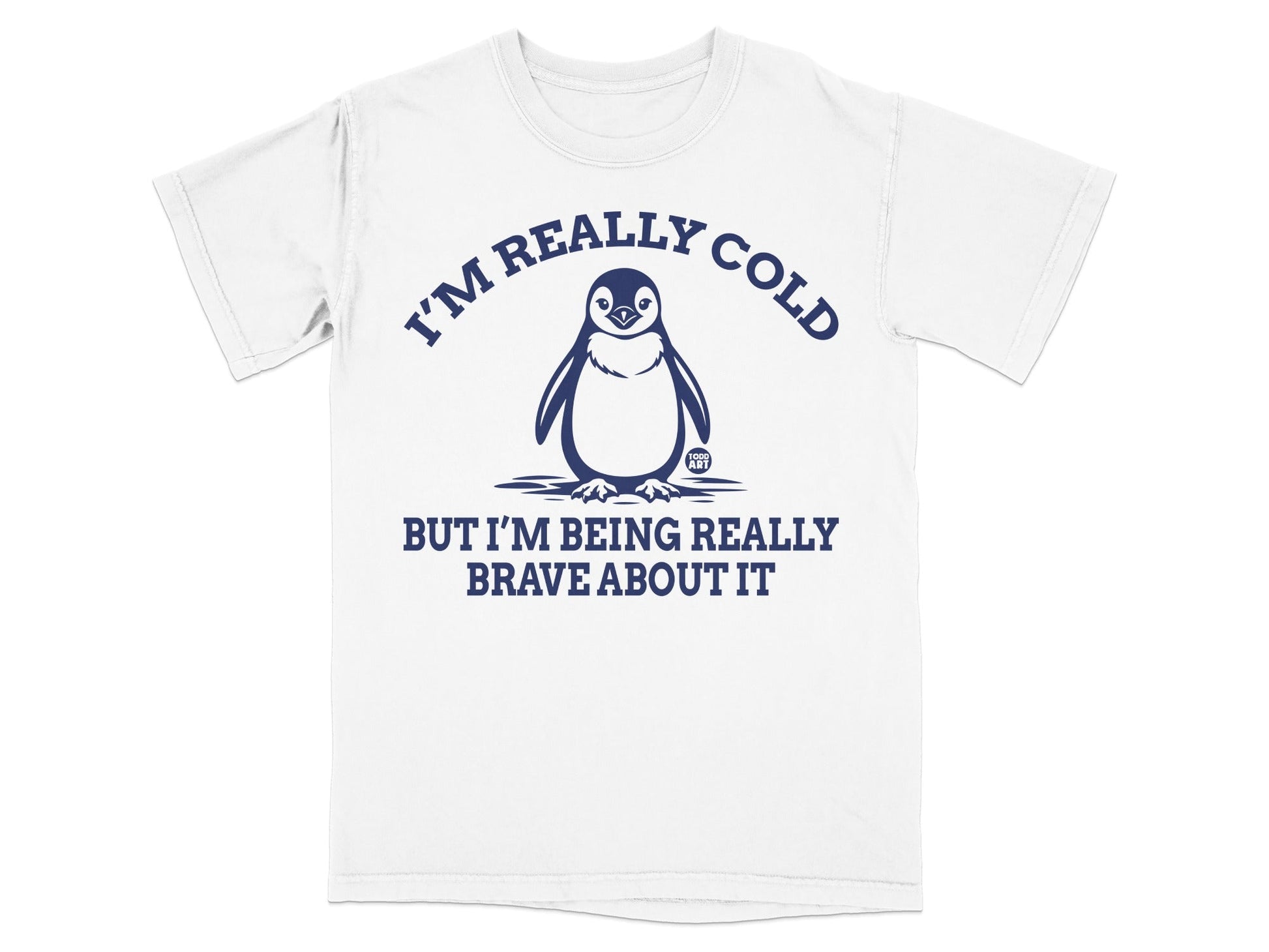 White t-shirt with a penguin graphic and the text "I'm really cold but I'm being really brave about it."