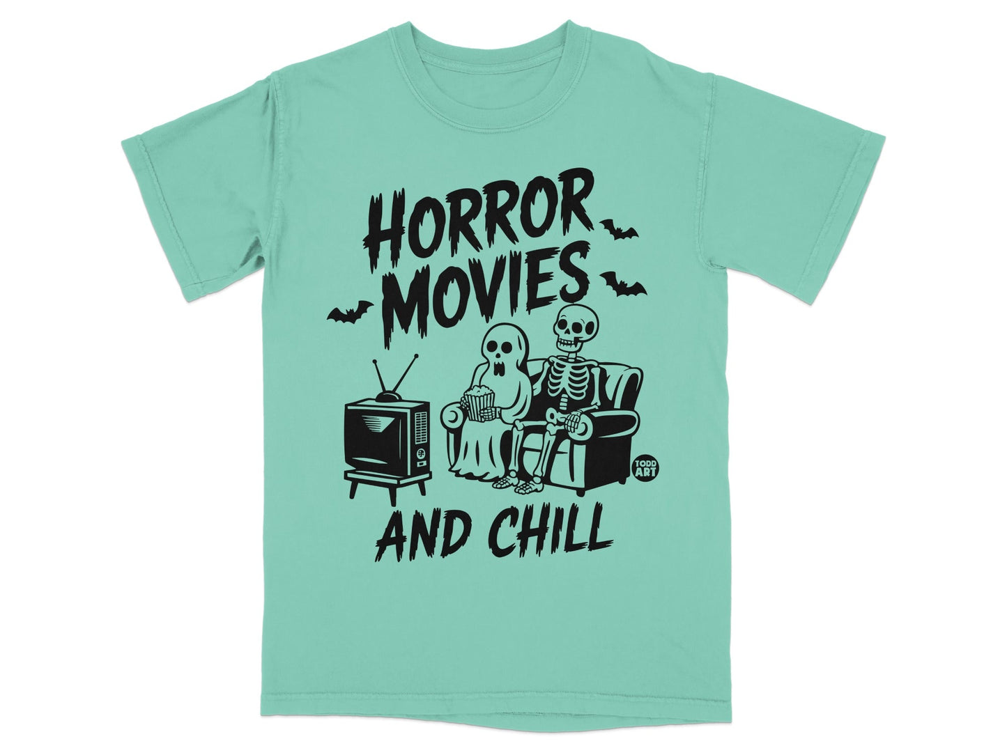 T-shirt with "Horror Movies and Chill" text, skeletons watching TV.