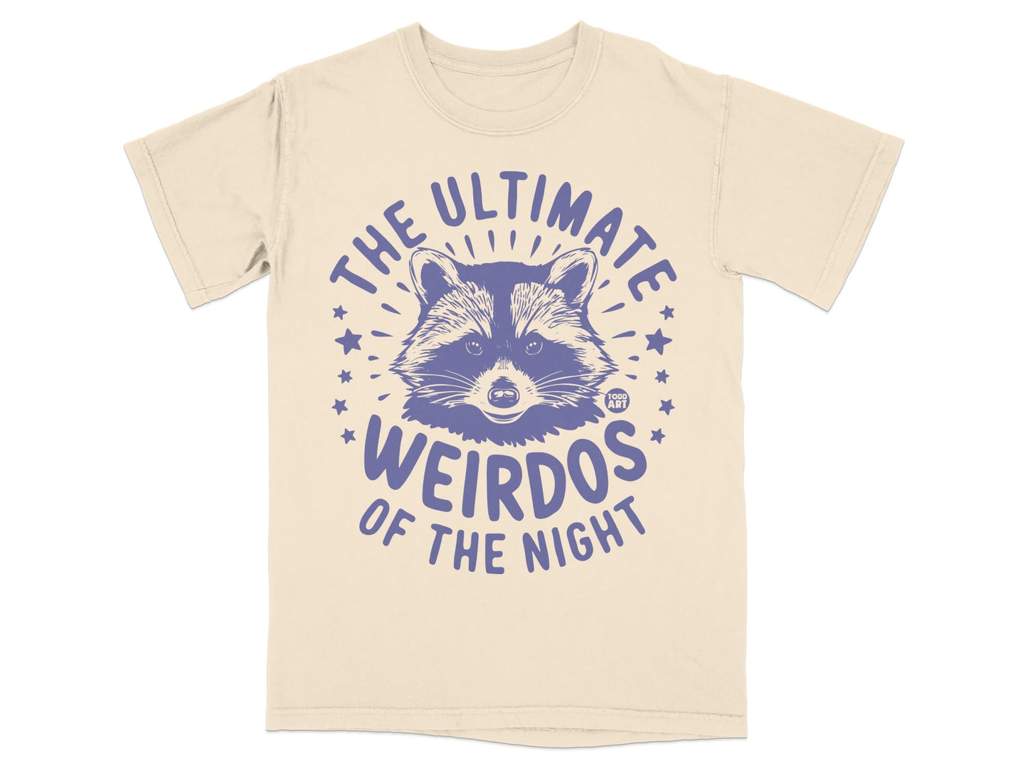 Cream t-shirt with "The Ultimate Weirdos of the Night" and a raccoon graphic.