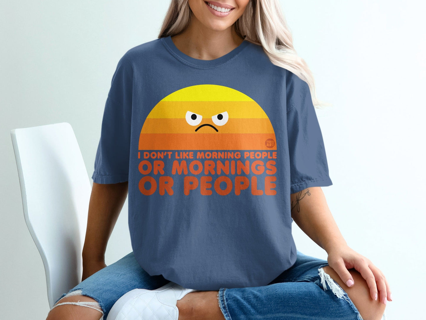 T-shirt with a grumpy sun graphic and text "I don't like morning people or people".