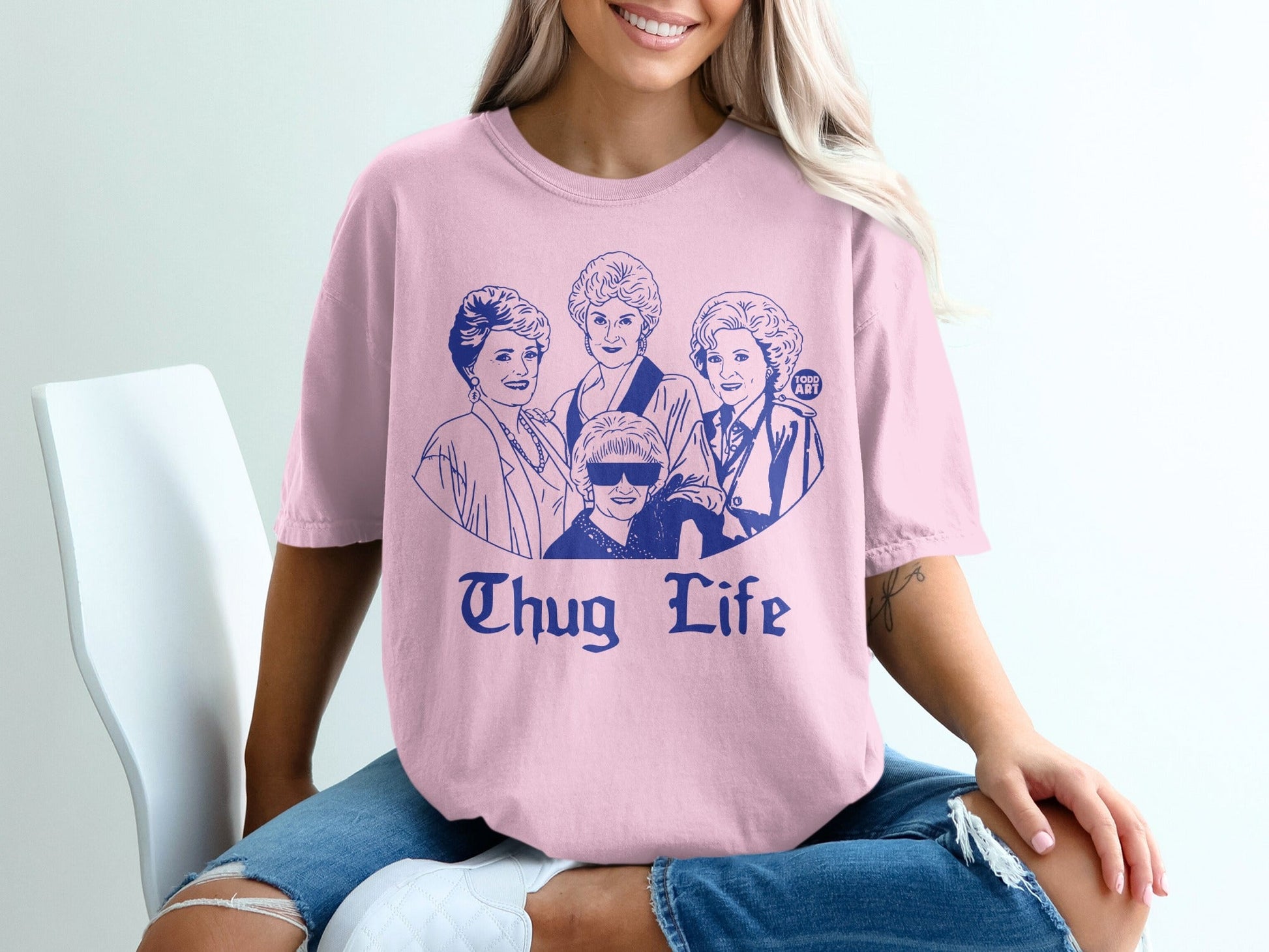 Pink t-shirt with "Thug Life" text and The Golden Girls characters.