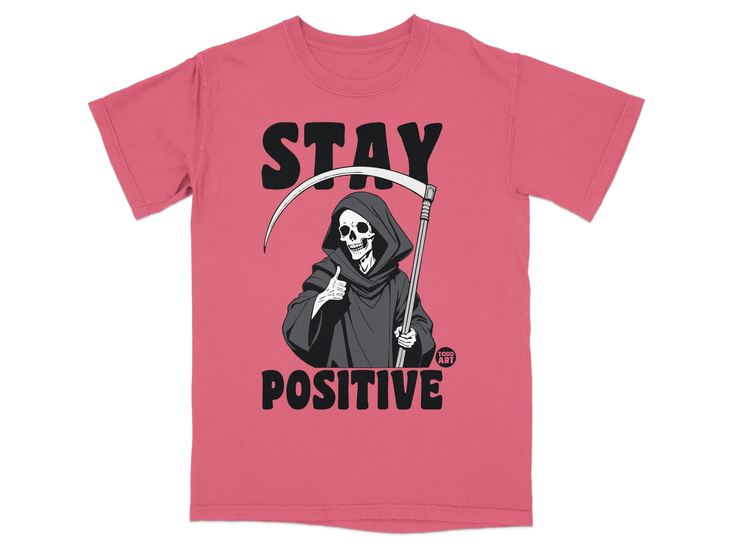 Grim Reaper giving a thumbs up on a pink t-shirt with "STAY POSITIVE" text.