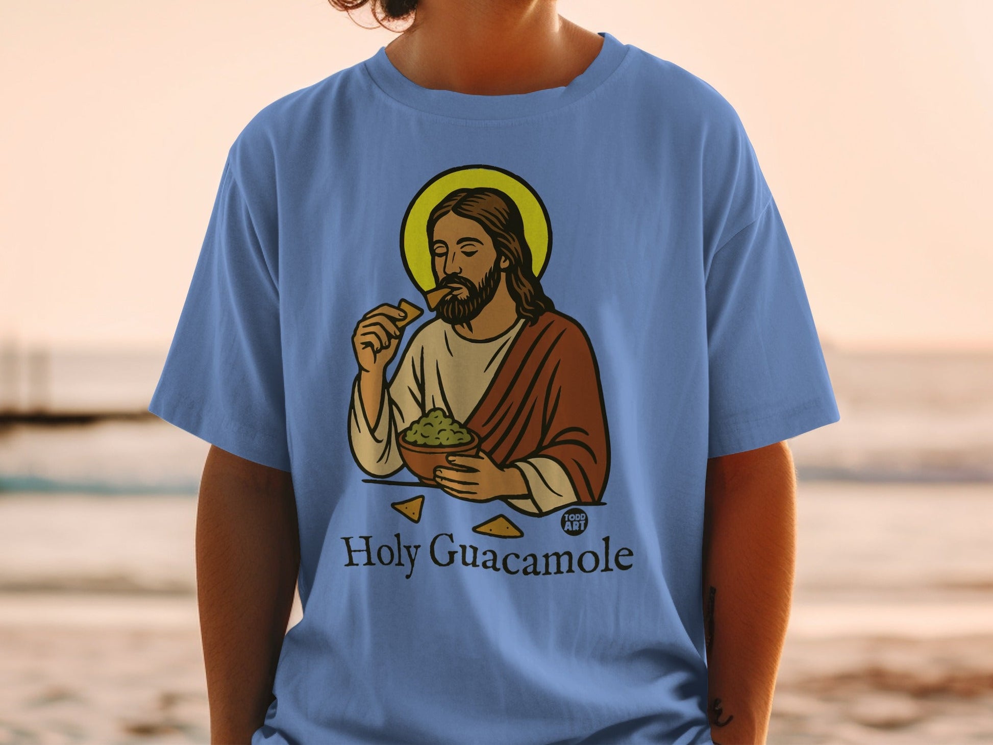 Jesus eating guacamole from a bowl, with text "Holy Guacamole".