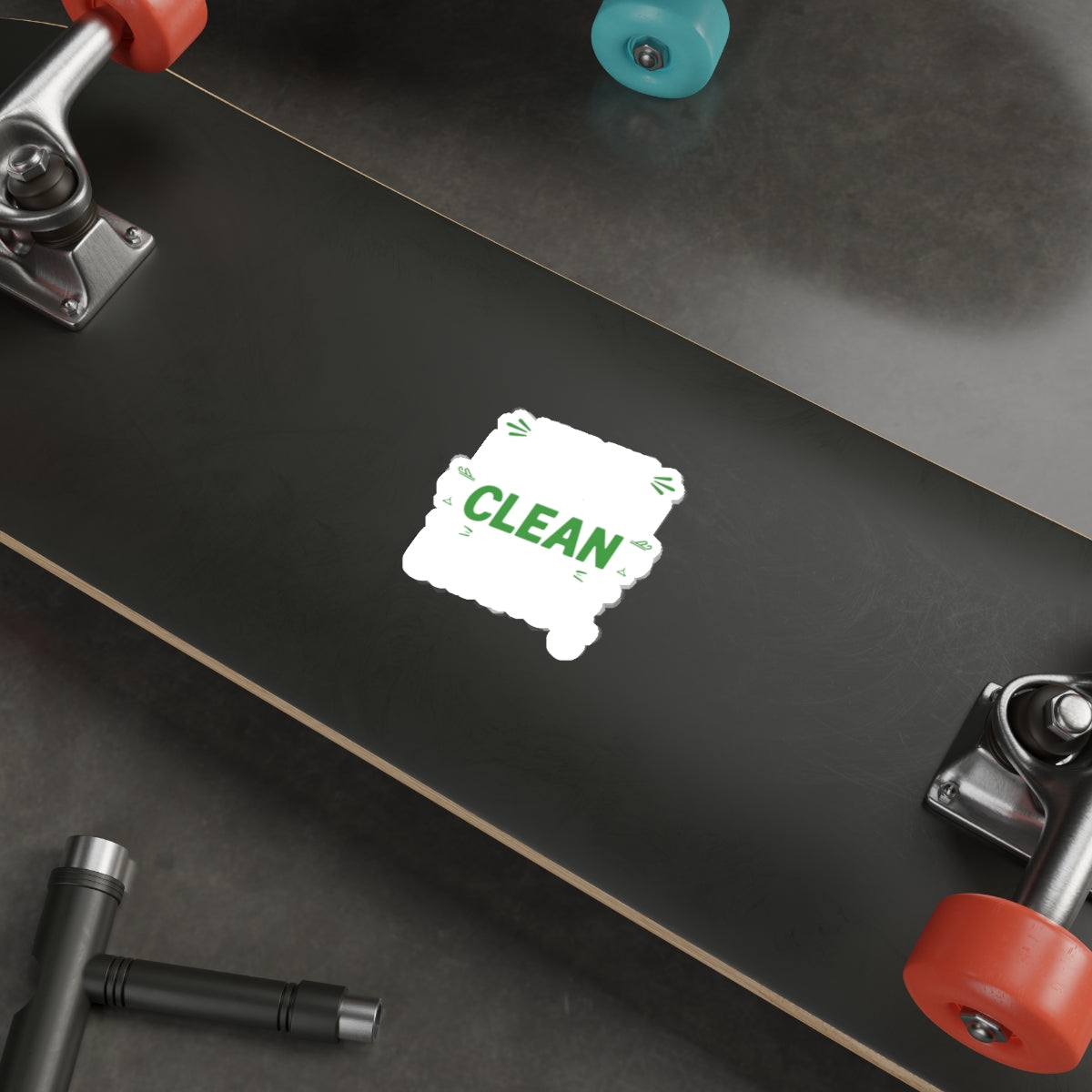 Clean Design Black Skateboard Deck with Red and Blue Wheels
