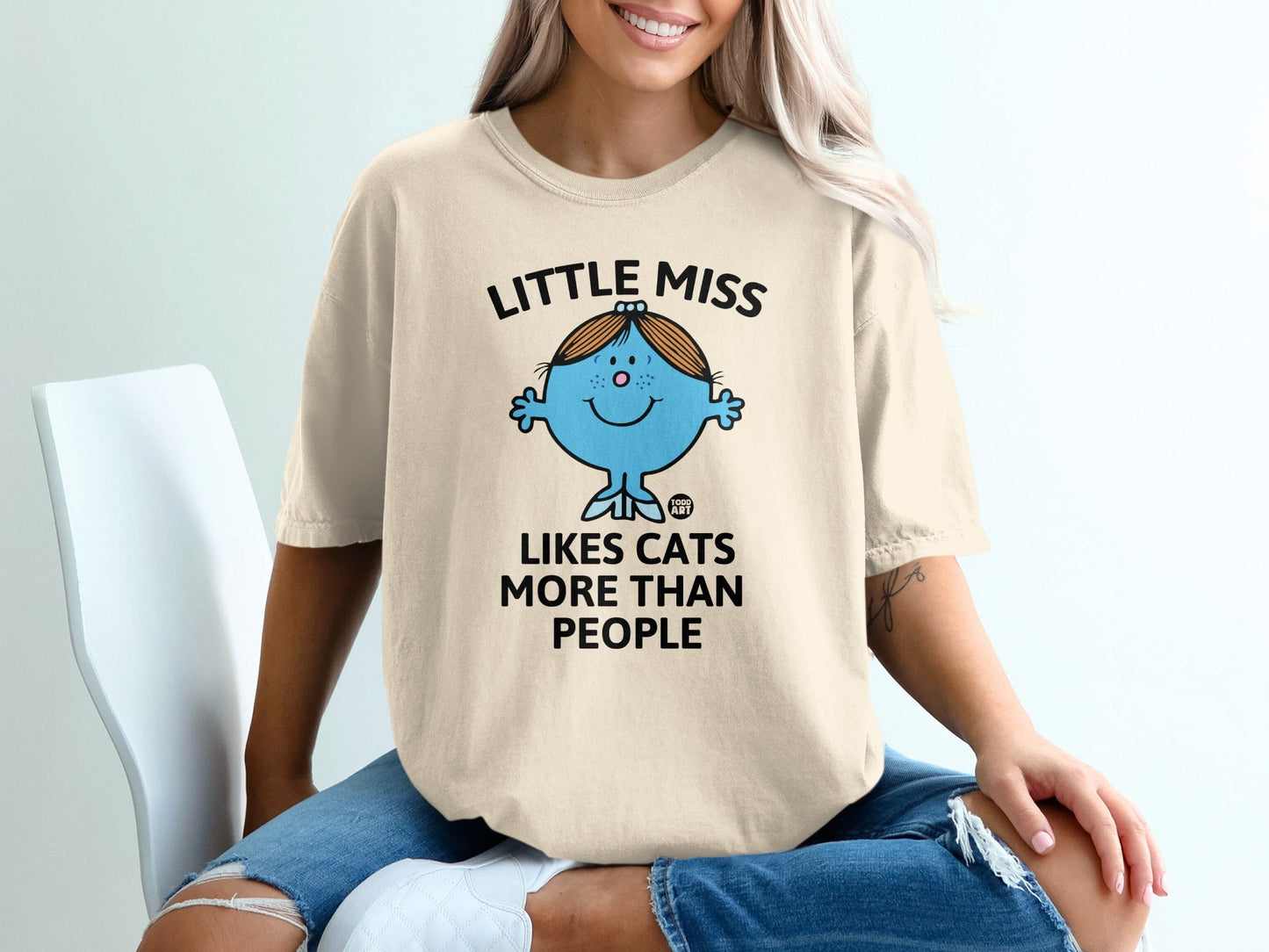T-shirt with Little Miss character saying "Likes Cats More Than People."