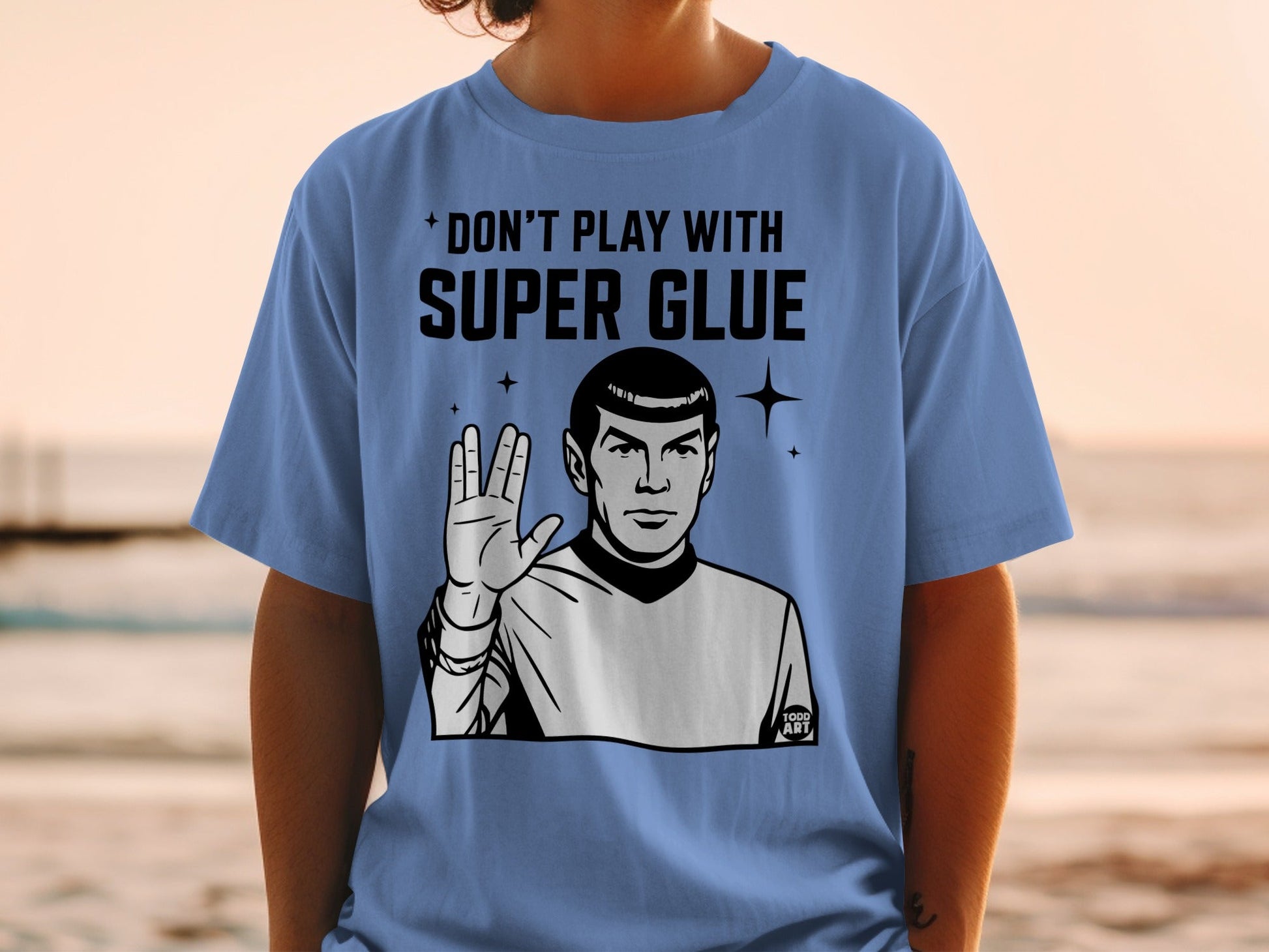 T-shirt with "Don't Play With Super Glue" and Spock giving Vulcan salute.