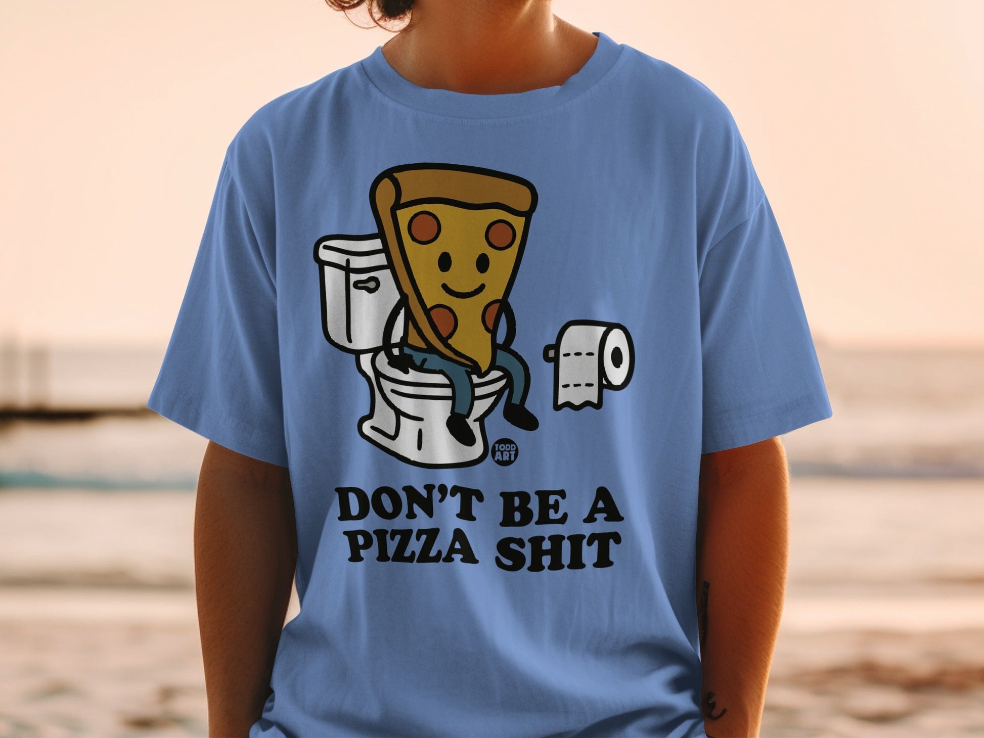 Blue t-shirt with cartoon pizza slice on toilet, "DON'T BE A PIZZA SHIT" text.