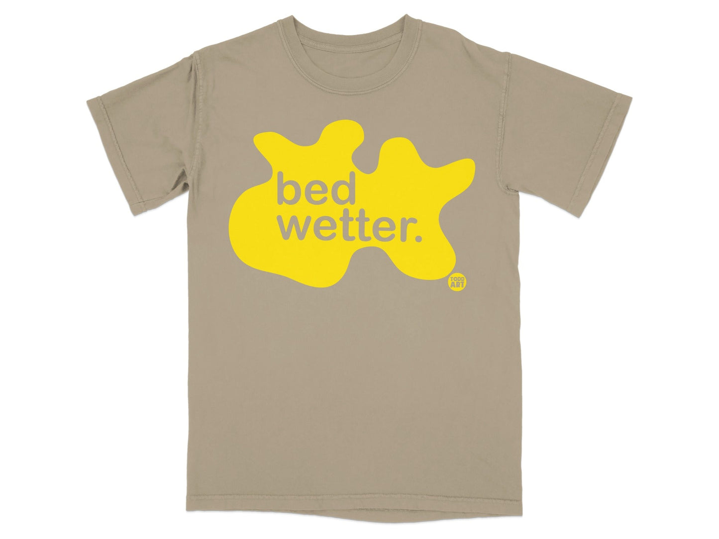 Tan t-shirt with yellow blob graphic and "bed wetter." text.