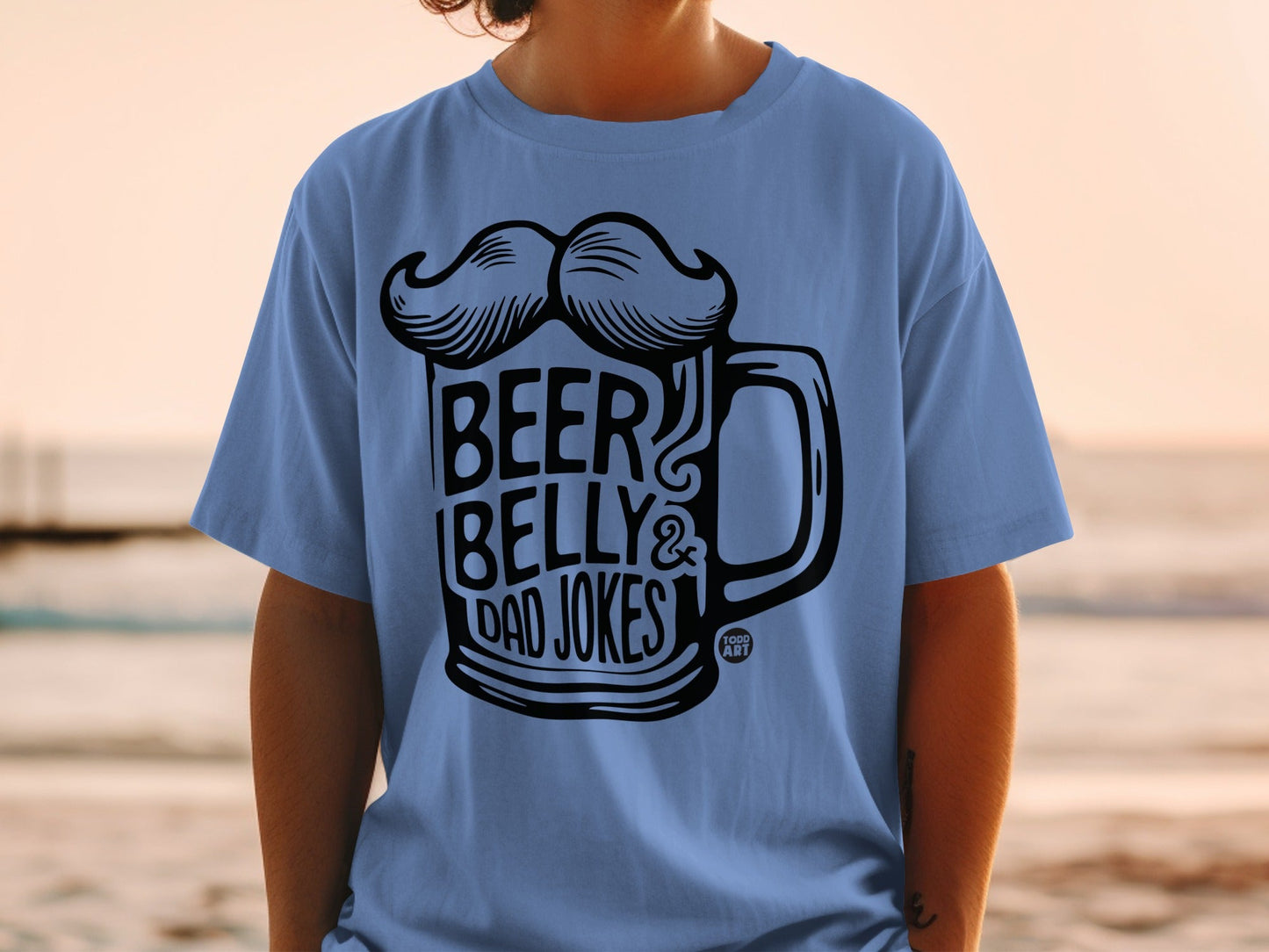 Blue t-shirt with "BEER BELLY & DAD JOKES" graphic featuring a mustache and beer mug.