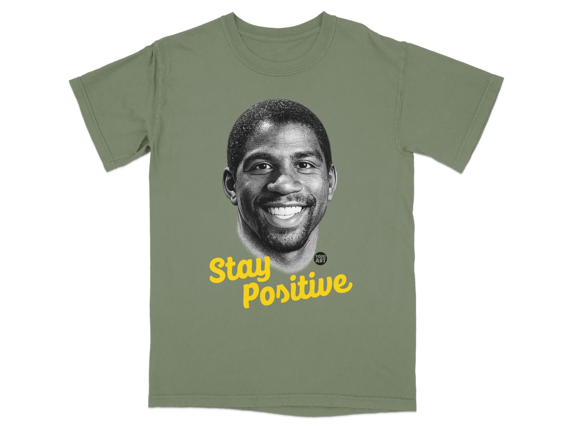 Green t-shirt with Magic Johnson's portrait and "Stay Positive" text.