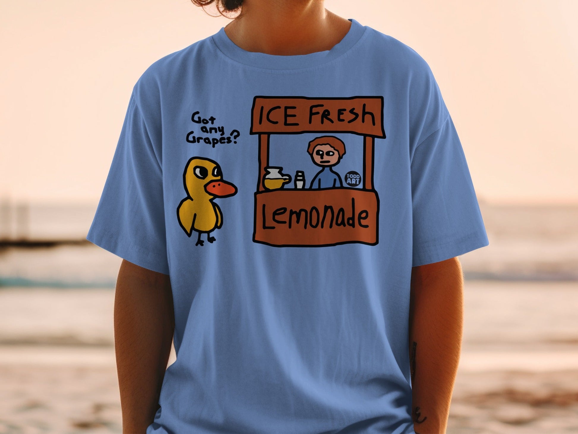 Duck asking for grapes at a lemonade stand with "FOOD ART" sign.