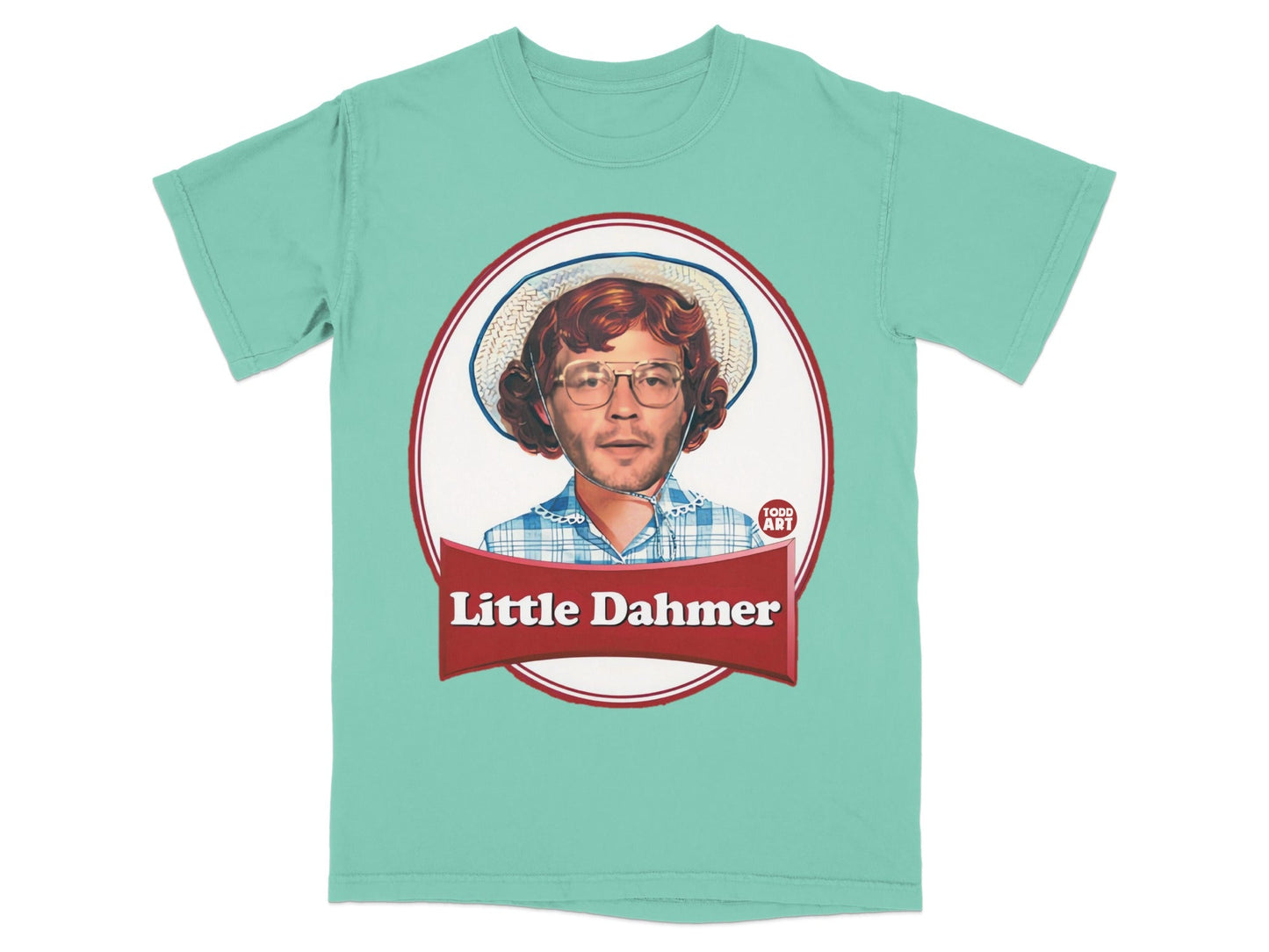 T-shirt featuring a cartoon portrait of a young boy with glasses and a hat.
