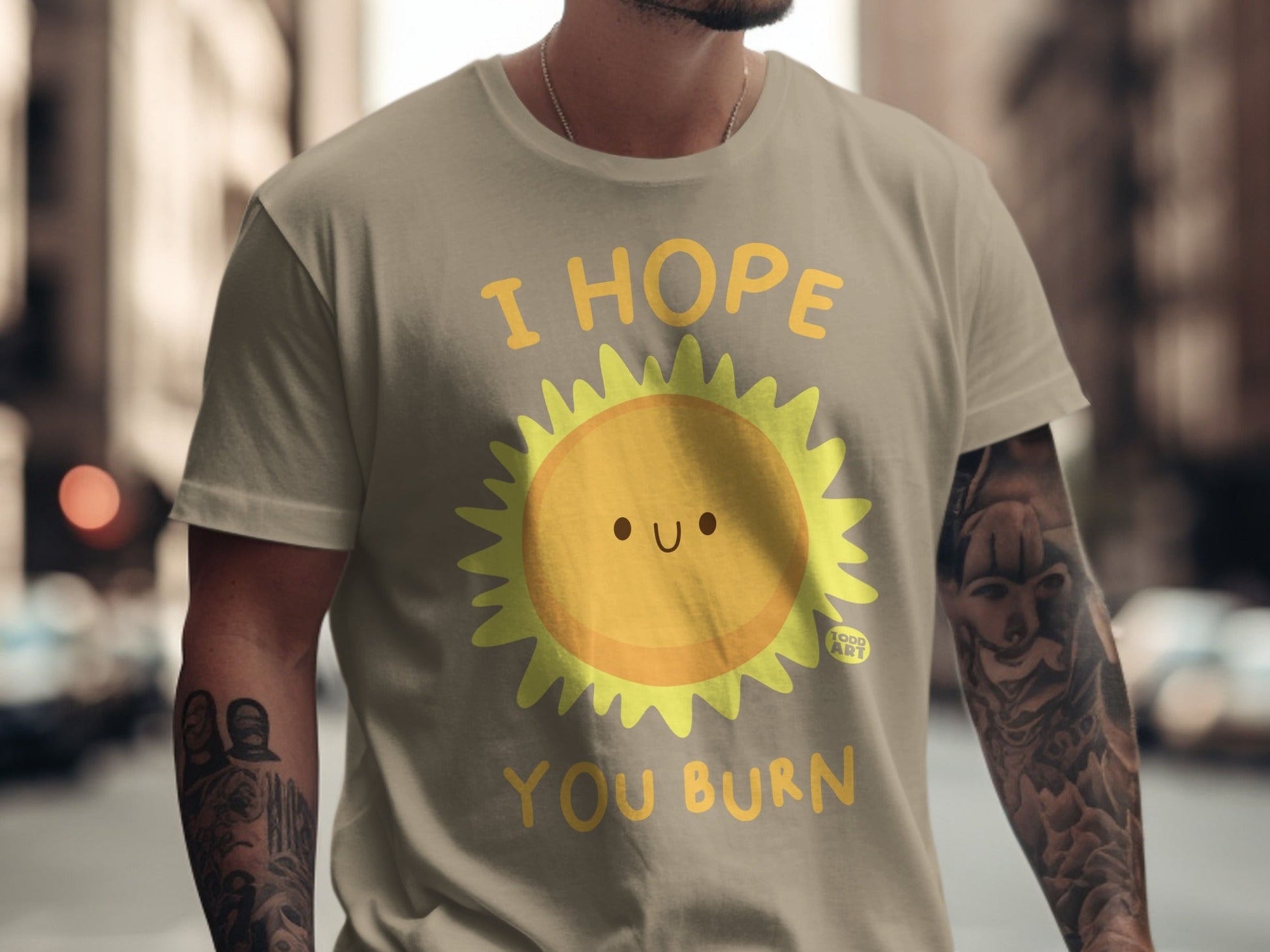 T-shirt with smiling sun graphic and text "I HOPE YOU BURN".